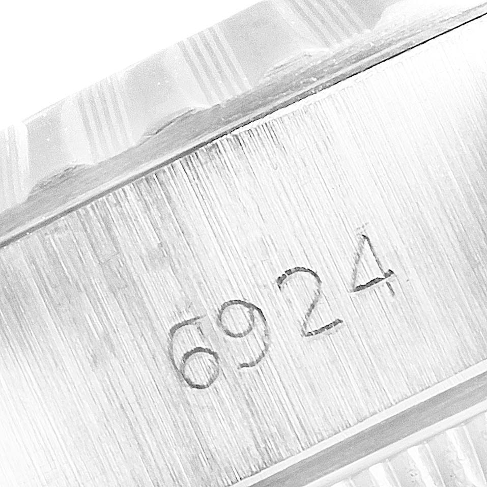 This image shows a close-up of the case with the model number "6924" on a Rolex Date 6924 Women's Stainless Steel Silver Dial 6924 Women's Stainless Steel Silver Dial watch.