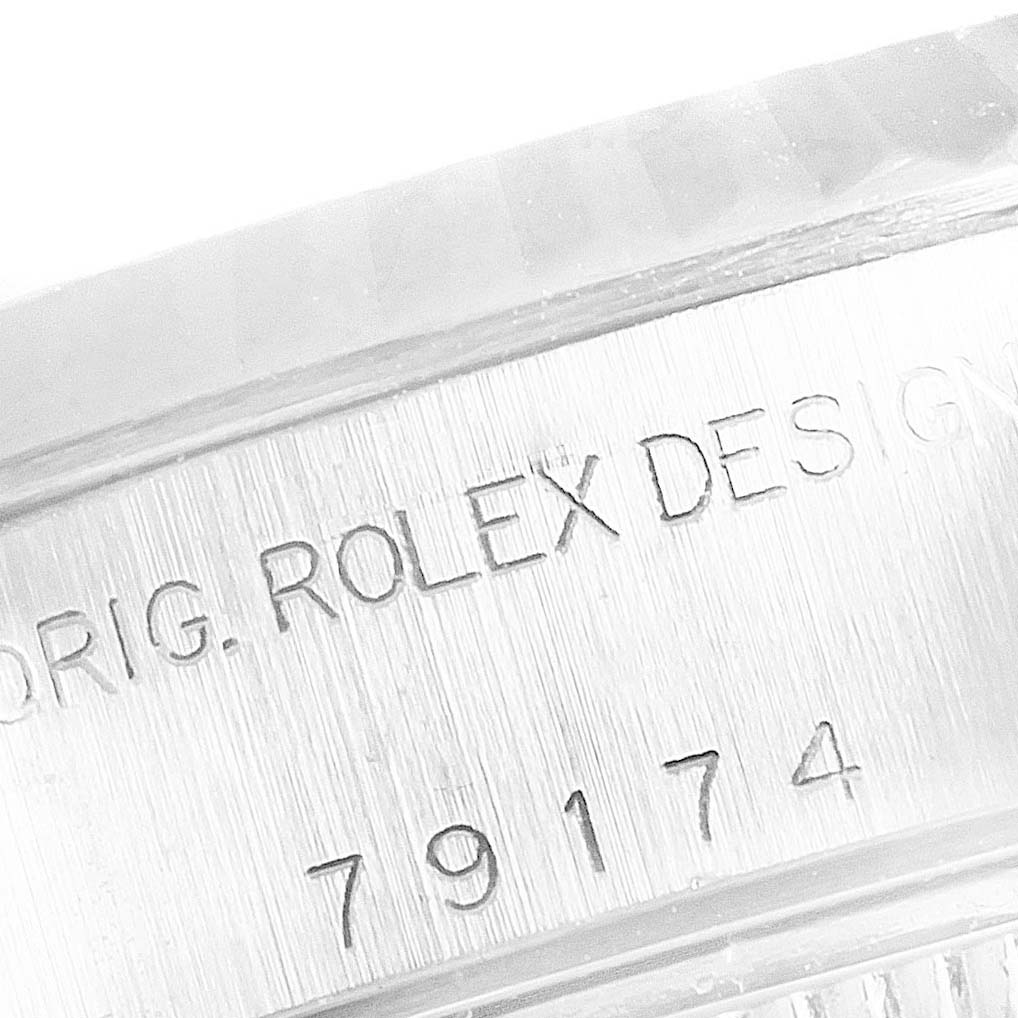 The image shows a close-up of the engraved model number and branding on the side of the casing of a Rolex Datejust 79174 Women's Stainless Steel Silver Dial 79174 Women's Stainless Steel Silver Dial watch.