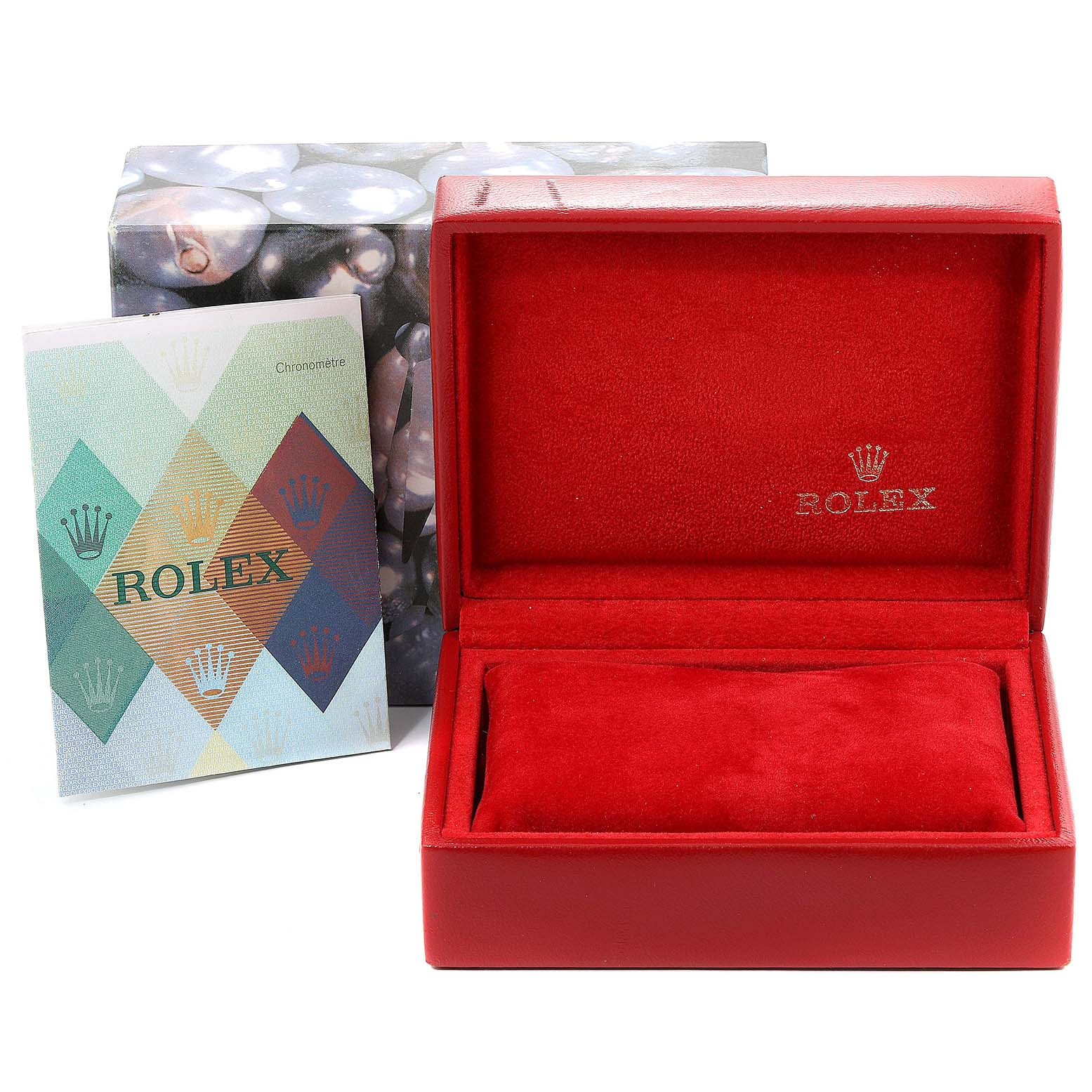 This image shows an open red Rolex watch box, a Rolex instruction booklet, and part of the outer packaging for a Datejust model.