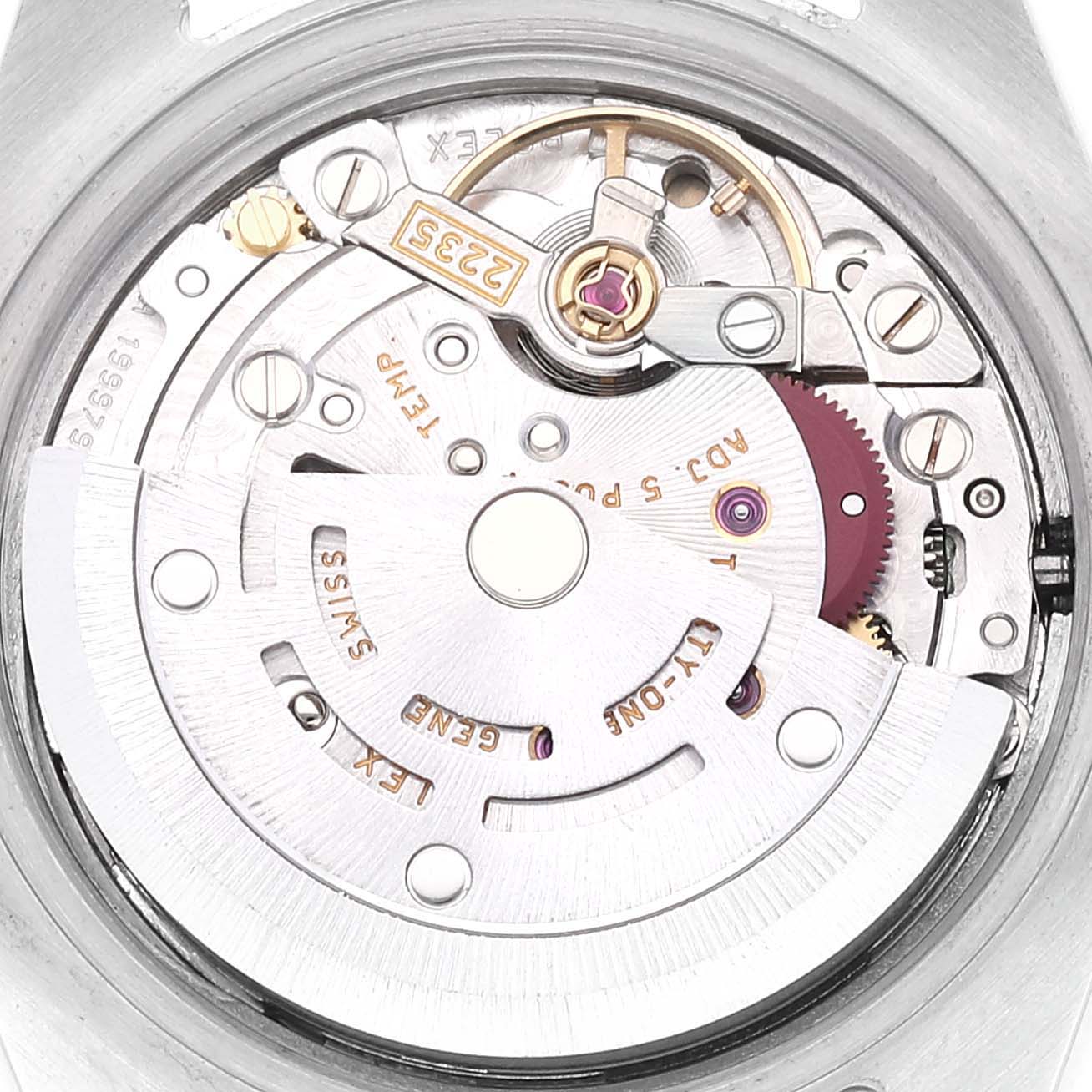 This image shows a close-up view of the movement mechanism inside a Rolex Datejust 179173 Women's Steel and Gold (two tone) Silver Dial 179173 Women's Steel and Gold (two tone) Silver Dial watch.