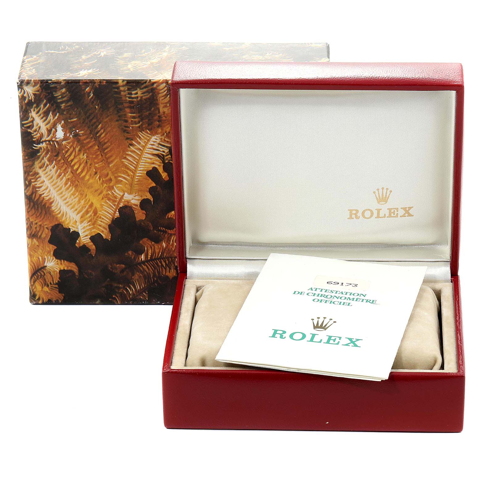 The image shows a Rolex Datejust 69173 Women's Steel and Gold (two tone) Champagne Dial 69173 Women's Steel and Gold (two tone) Champagne Dial watch box open with the outer sleeve and an official chronometer certification booklet.