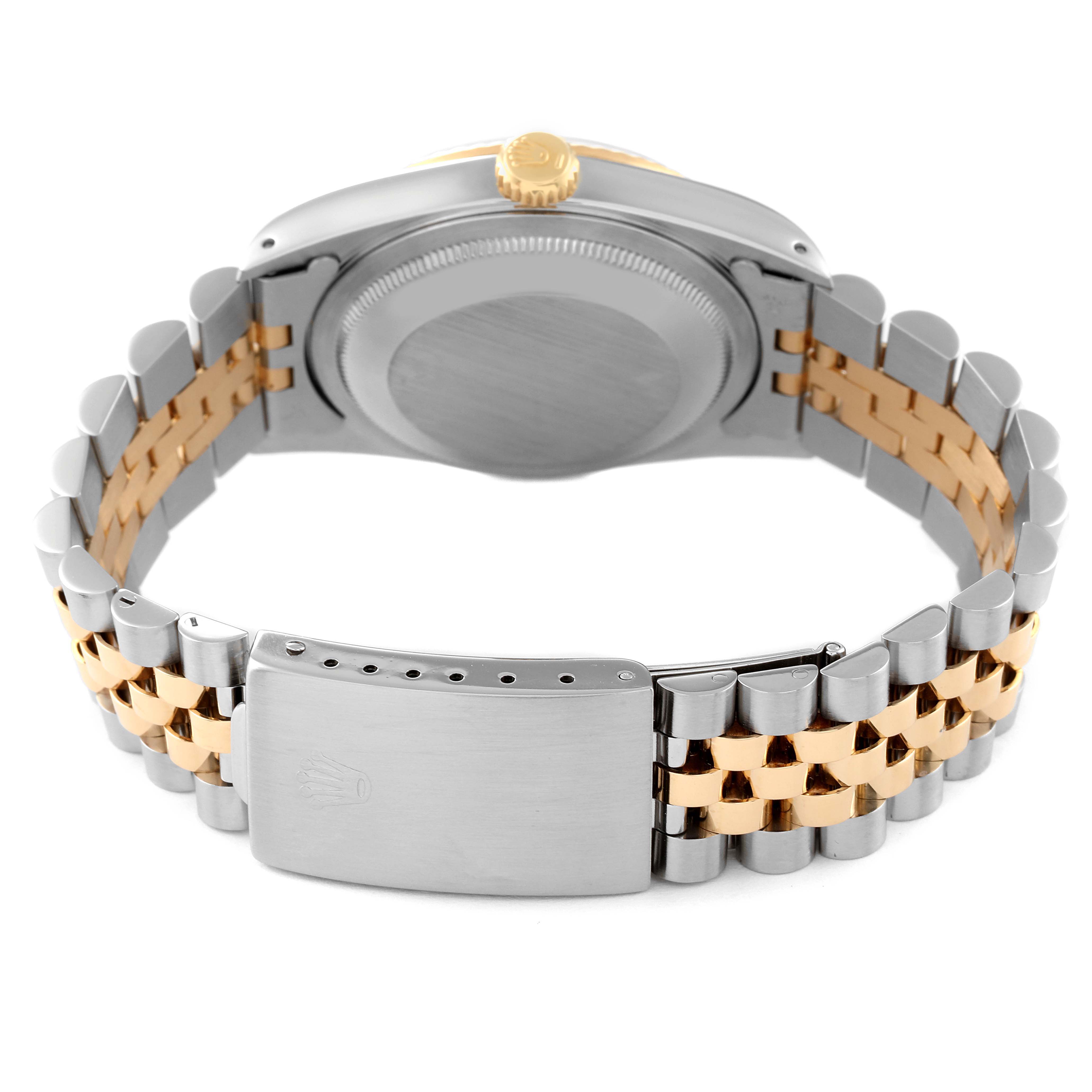 This image shows the backside and bracelet of a Rolex Datejust 16233 Men's Steel and Gold (two tone) Blue Dial 16233 Men's Steel and Gold (two tone) Blue Dial watch, highlighting the clasp and case back.