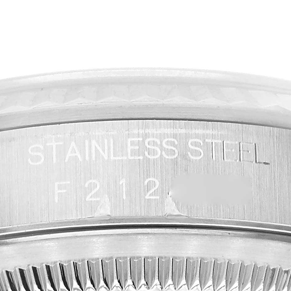 The image shows a close-up of the stainless steel case back, engravings, and bezel of the Rolex Datejust 16234 Men's Stainless Steel White Dial 16234 Men's Stainless Steel White Dial model.