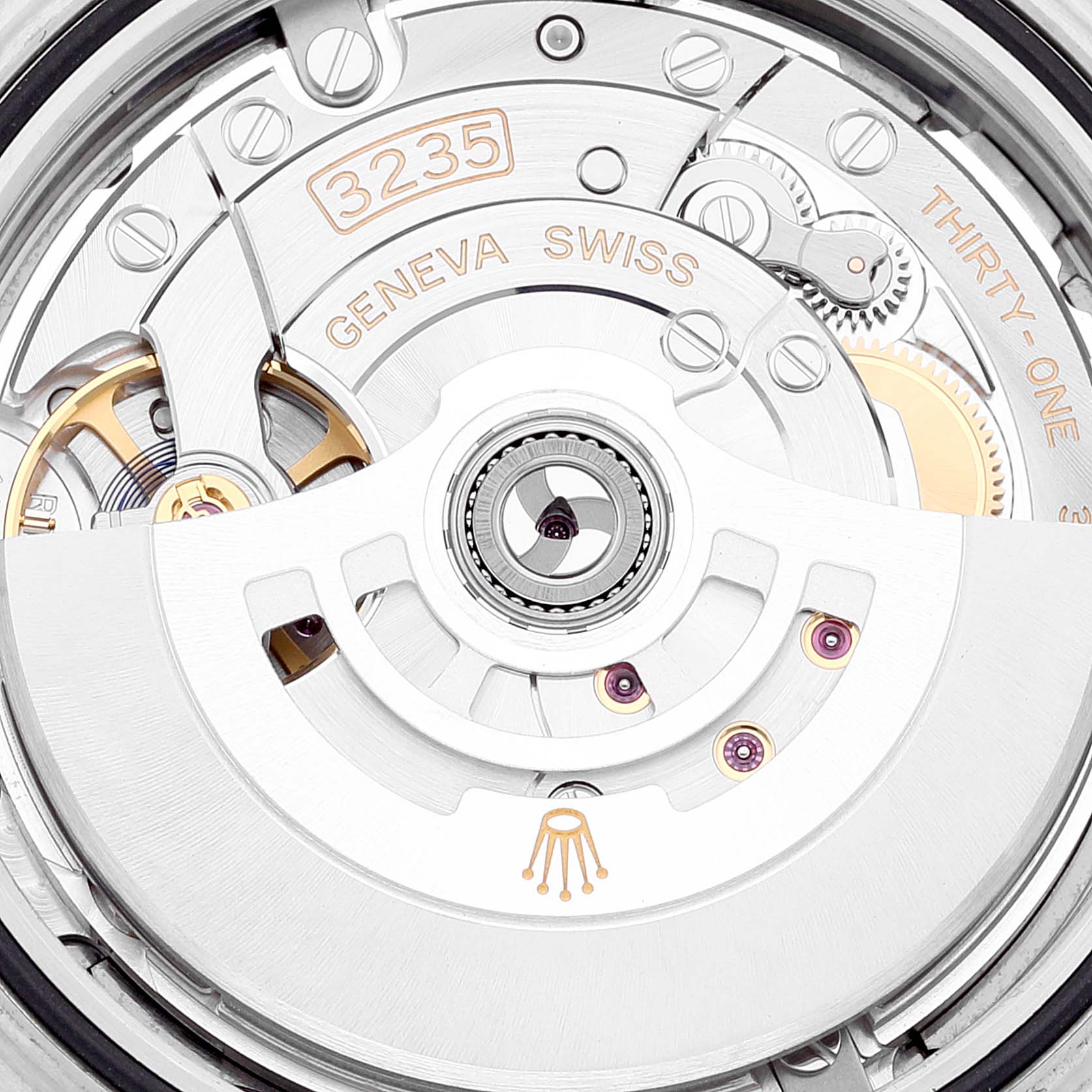 The image shows a close-up of the movement mechanism of a Rolex Datejust 41 126334 Men's Stainless Steel Blue Dial 126334 Men's Stainless Steel Blue Dial watch, highlighting the rotor and inner components.