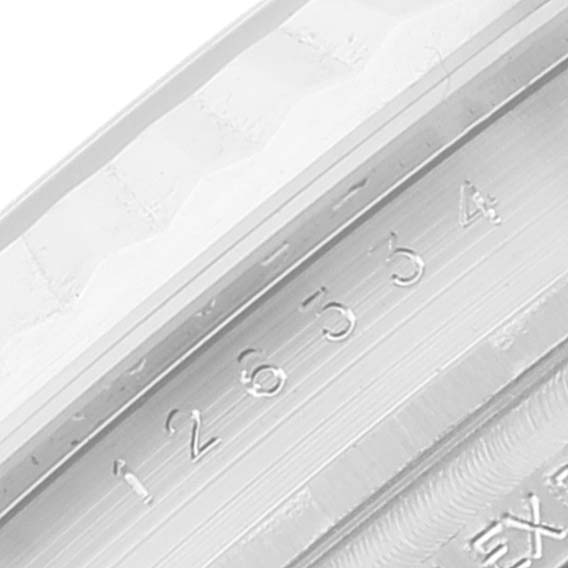 The image shows a close-up of the serial number etched on the inner bezel of a Rolex Datejust 41 126334 Men's Stainless Steel Blue Dial 126334 Men's Stainless Steel Blue Dial model.