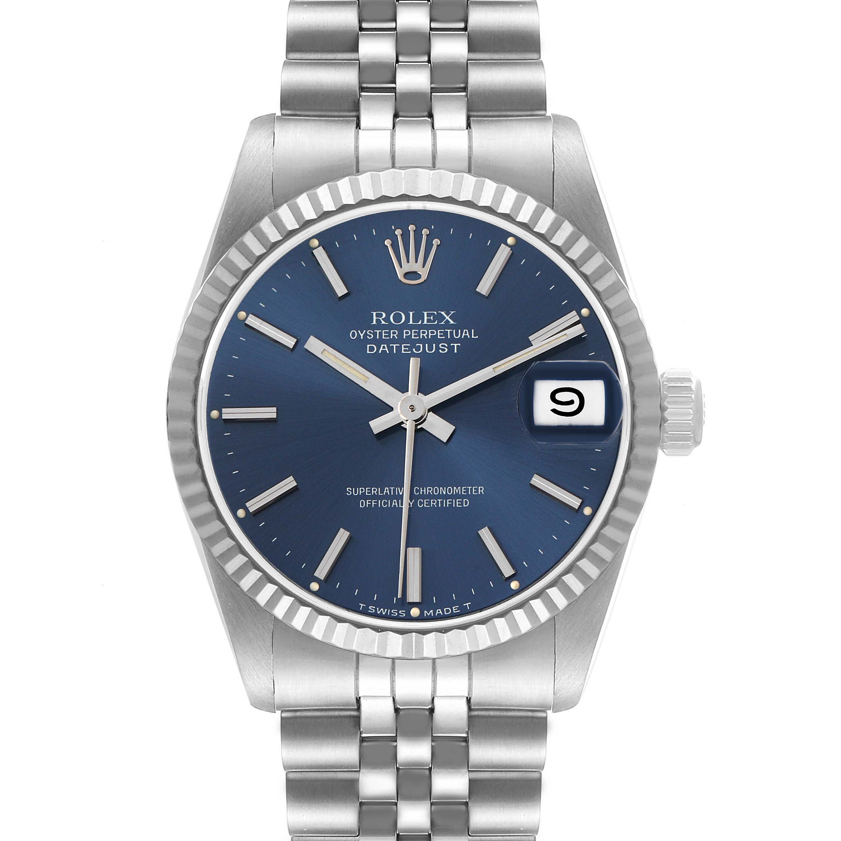 The Rolex Mid-Size 68274 Women's Stainless Steel Blue Dial Datejust watch is shown from the front, highlighting its blue dial, hands, date display, and Oyster bracelet.