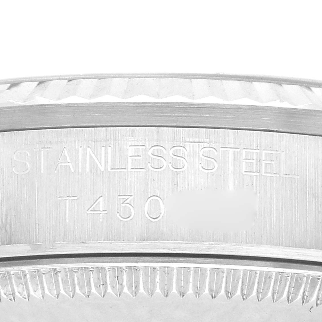 The image shows a close-up of the engraved stainless steel case back for a Rolex Mid-Size 68274 Women's Stainless Steel Blue Dial watch.