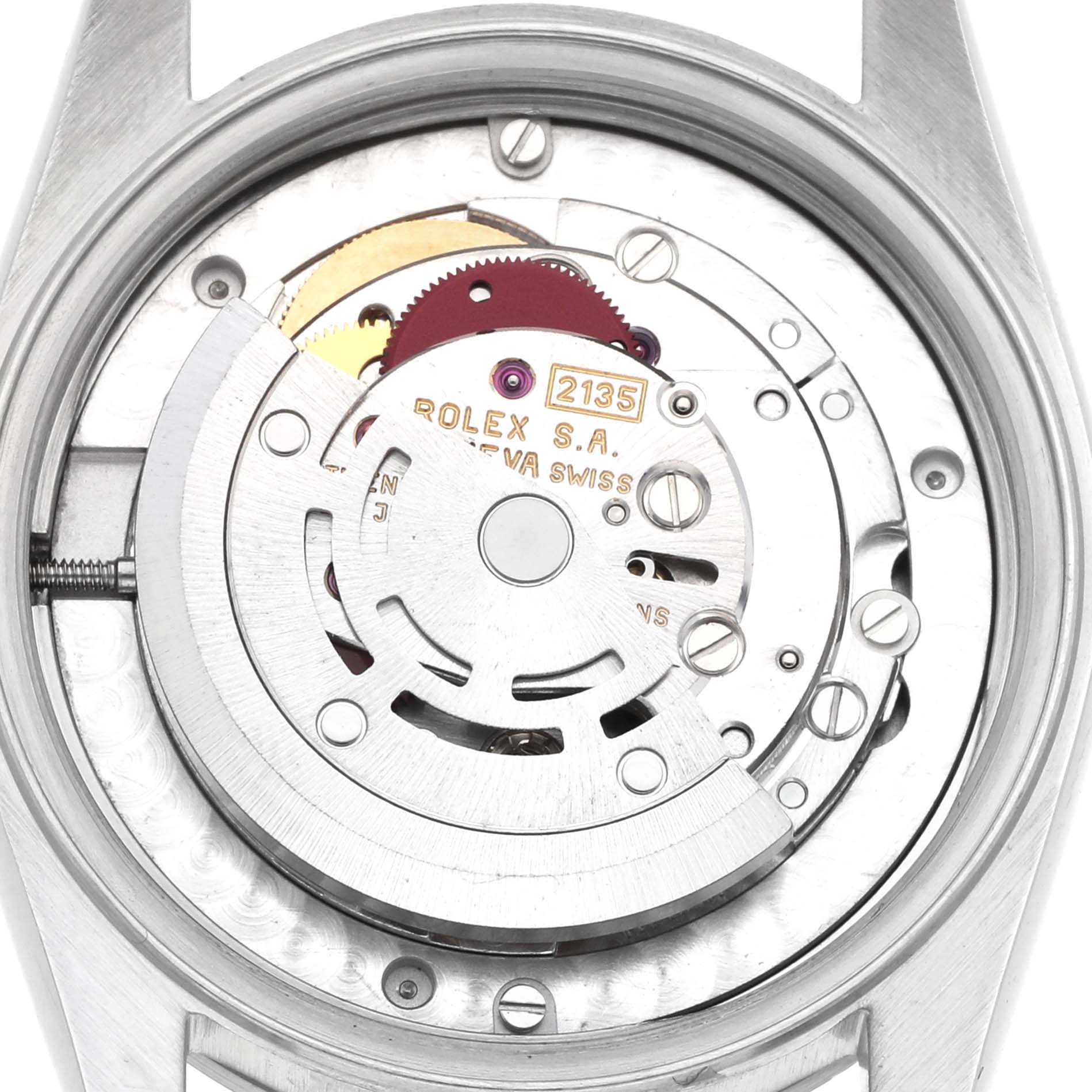 The image shows the movement of a Rolex Mid-Size 68274 Women's Stainless Steel Blue Dial watch, focusing on the internal mechanism from a top-down angle.
