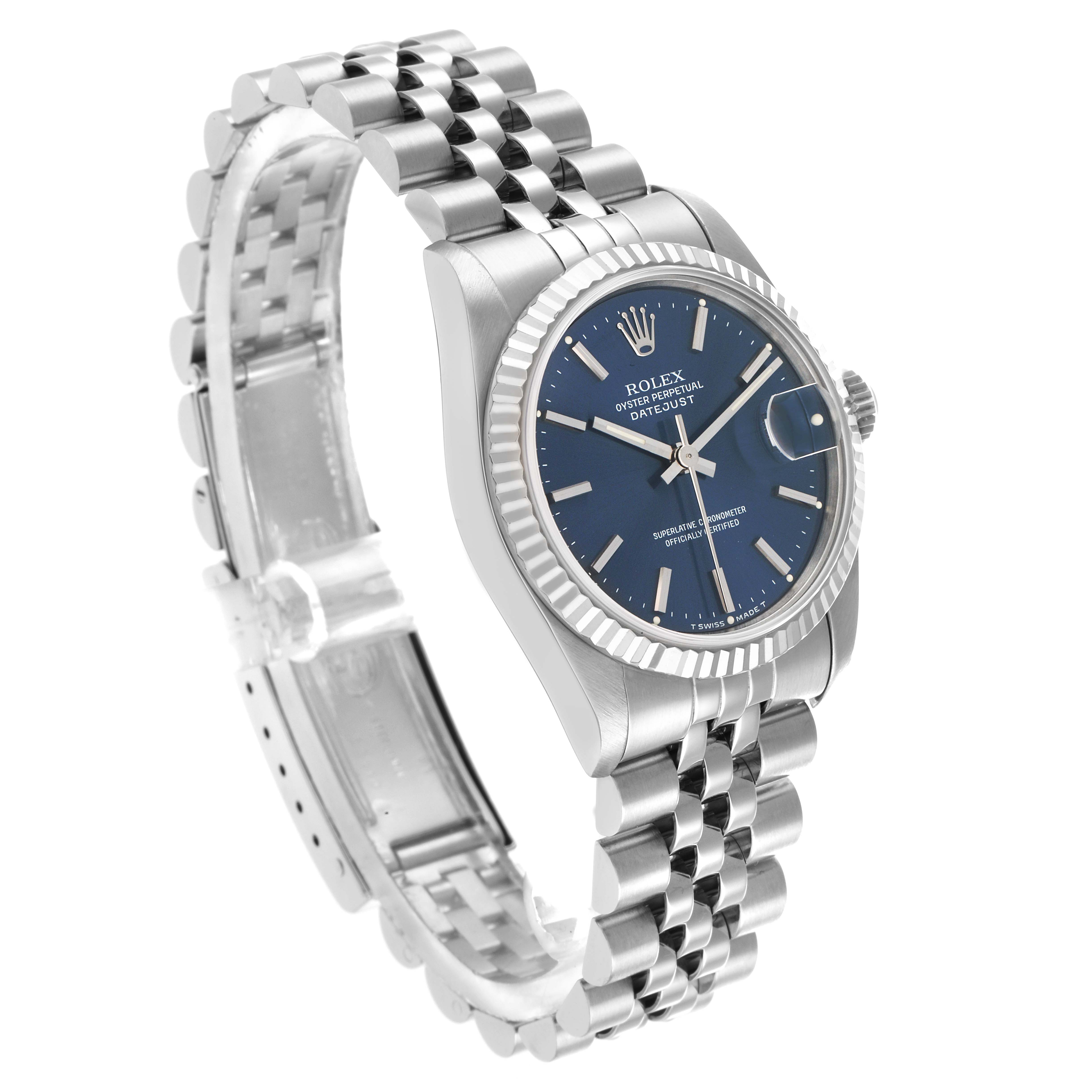 The Rolex Mid-Size 68274 Women's Stainless Steel Blue Dial watch is shown at a three-quarter angle, displaying the face, bezel, crown, and part of the bracelet.