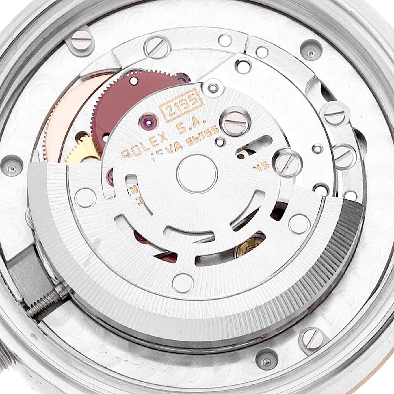This is a close-up of the Rolex Datejust 68273 Women
s Stainless Steel Champagne Dial 68273 Women
s Stainless Steel Champagne Dial movement, showing the intricate internal gears and components.