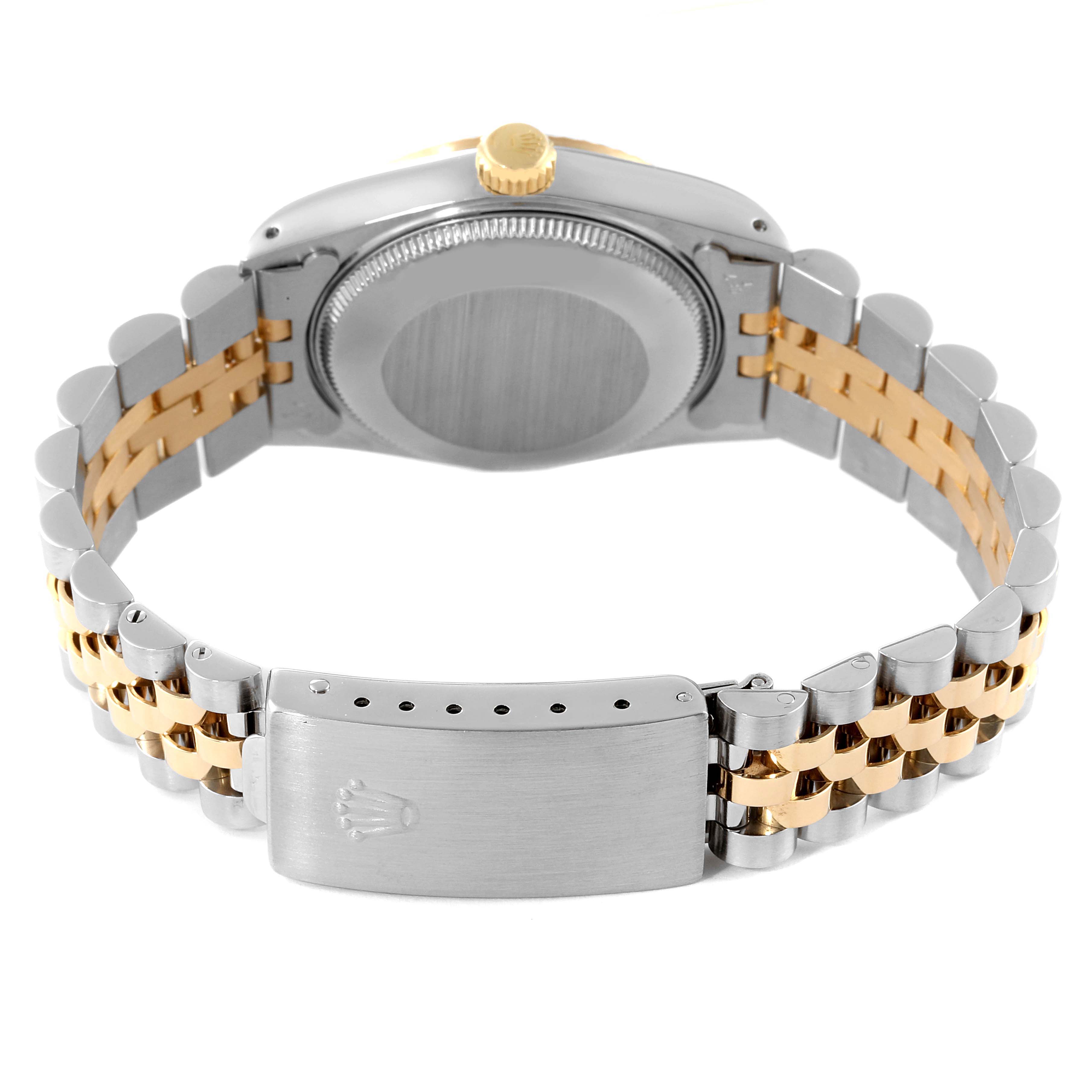 This image shows the back view of a Rolex Datejust 68273 Women
s Stainless Steel Champagne Dial 68273 Women
s Stainless Steel Champagne Dial watch, highlighting the case, crown, and two-tone bracelet with clasp.
