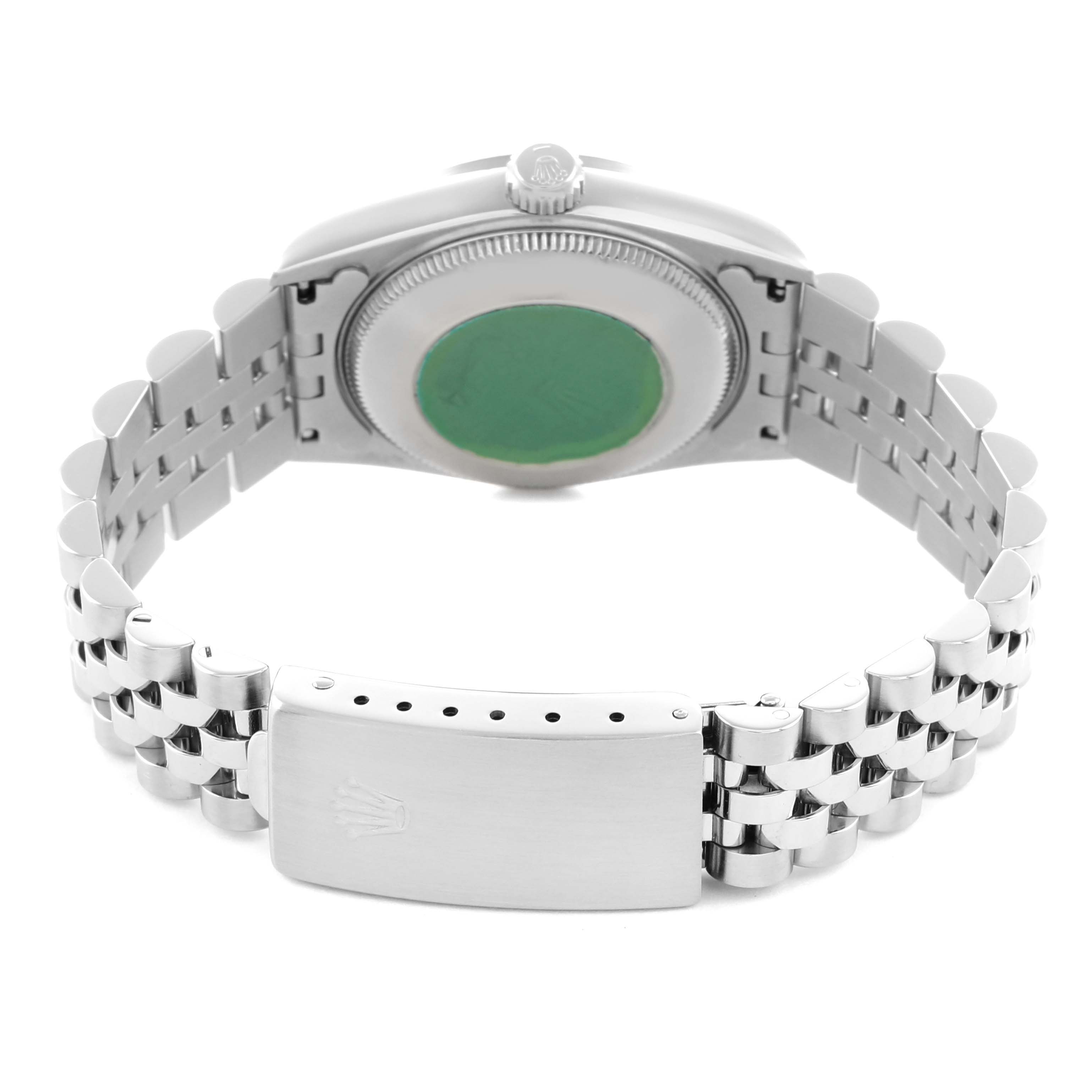 The Rolex Mid-Size 68274 Women's Stainless Steel White Dial model is shown from the back, highlighting the case back, crown, bracelet, and clasp.