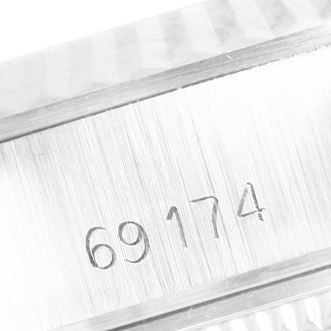 The image shows a close-up of the model number engraving (69174) on the case of a Rolex Datejust 69174 Women's Stainless Steel Silver Dial 69174 Women's Stainless Steel Silver Dial watch.
