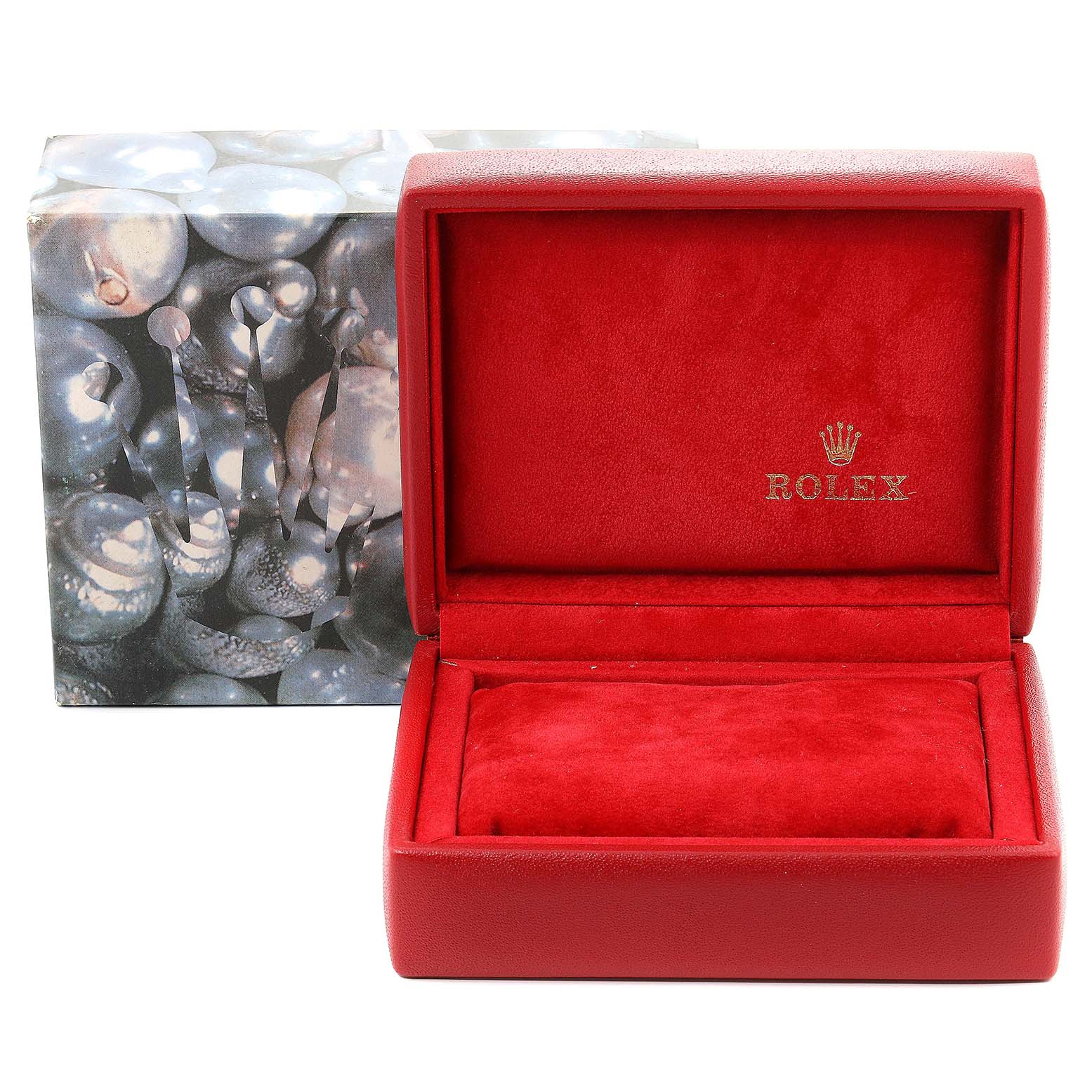 The image shows an open, red Rolex watch box for the Datejust model, accompanied by its decorative outer packaging.