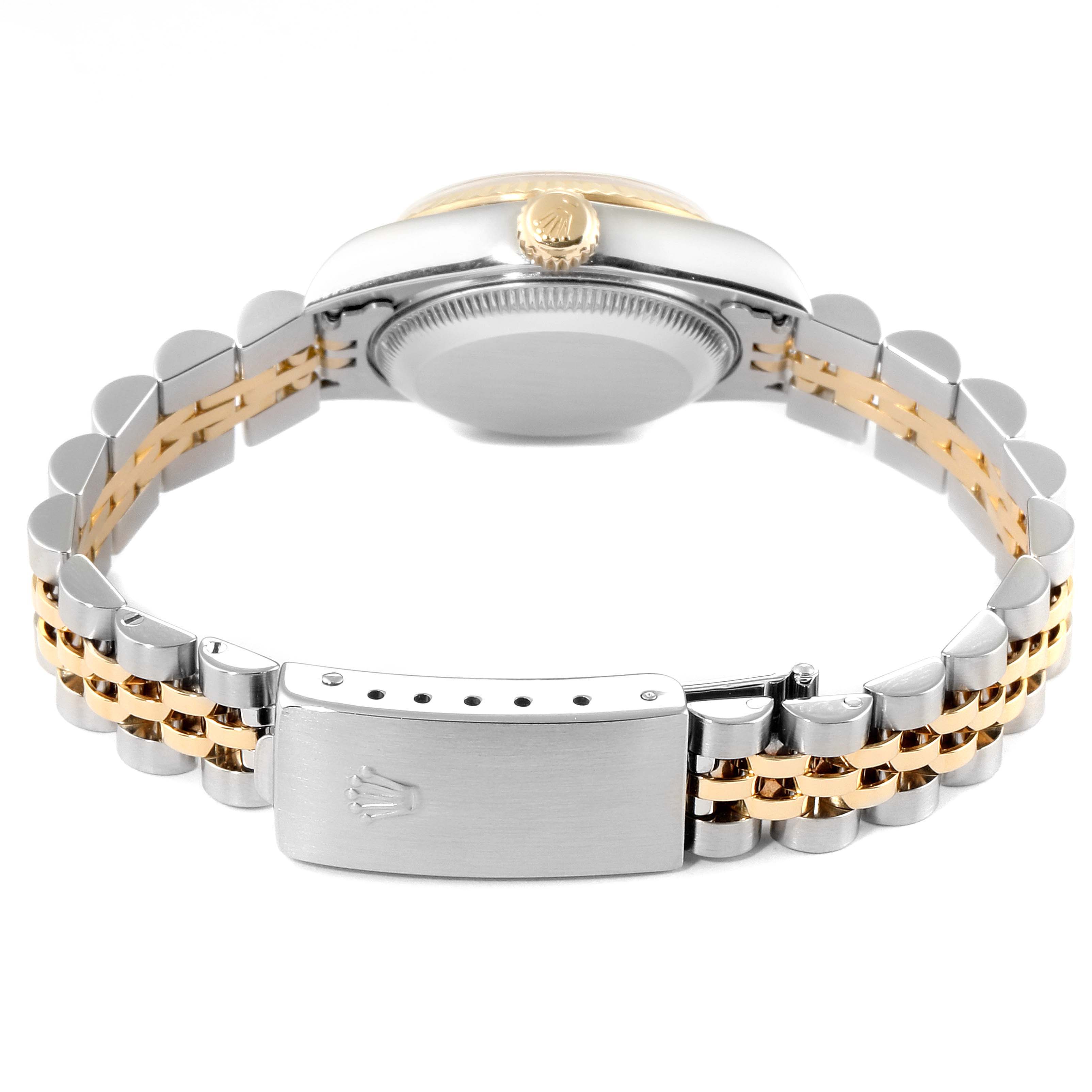 The image shows the backside and clasp of a Rolex Datejust 79173 Women's Steel and Gold (two tone) Champagne Dial 79173 Women's Steel and Gold (two tone) Champagne Dial watch, highlighting the bracelet and crown.