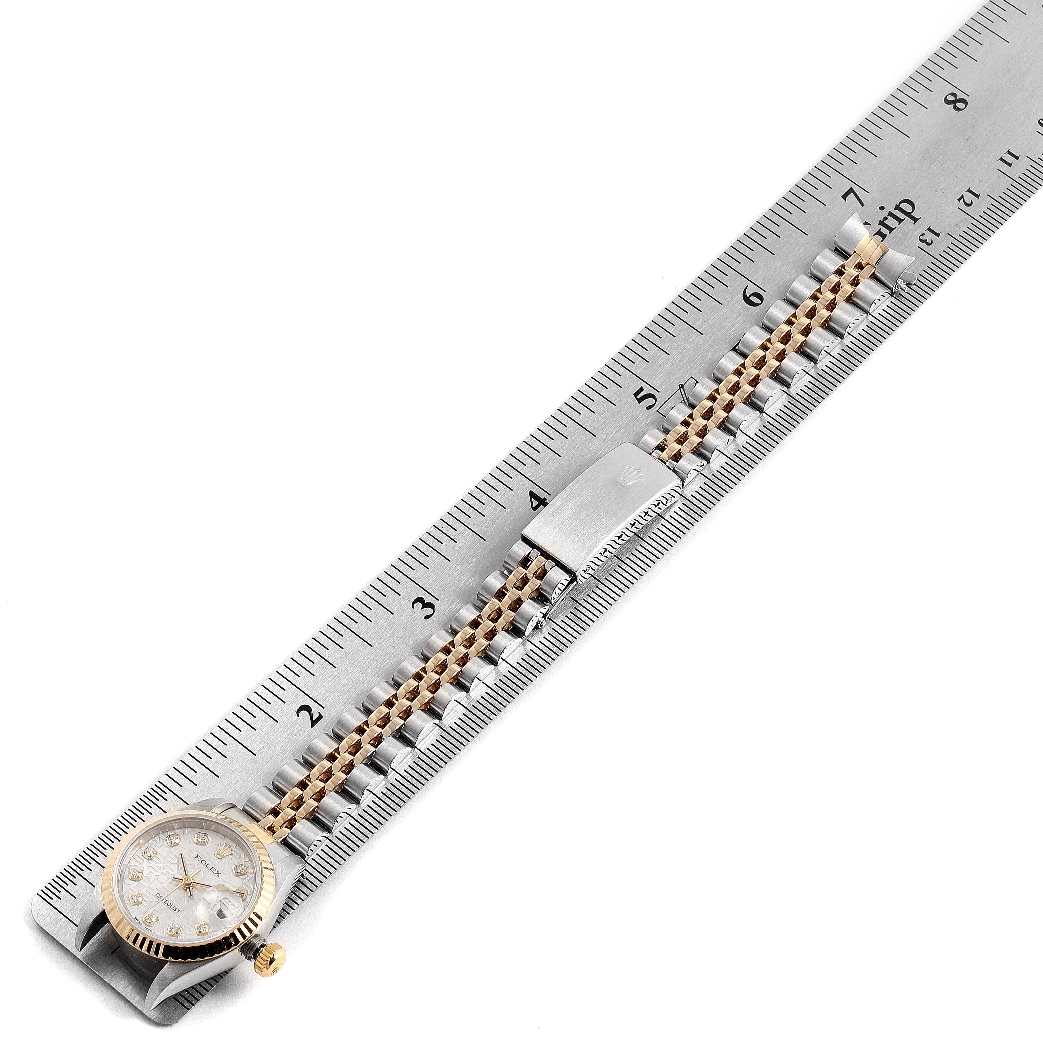 The image shows a Rolex Datejust 79173 Women's Stainless Steel Silver Dial 79173 Women's Stainless Steel Silver Dial model watch measured alongside a ruler, displaying its bracelet and clasp.