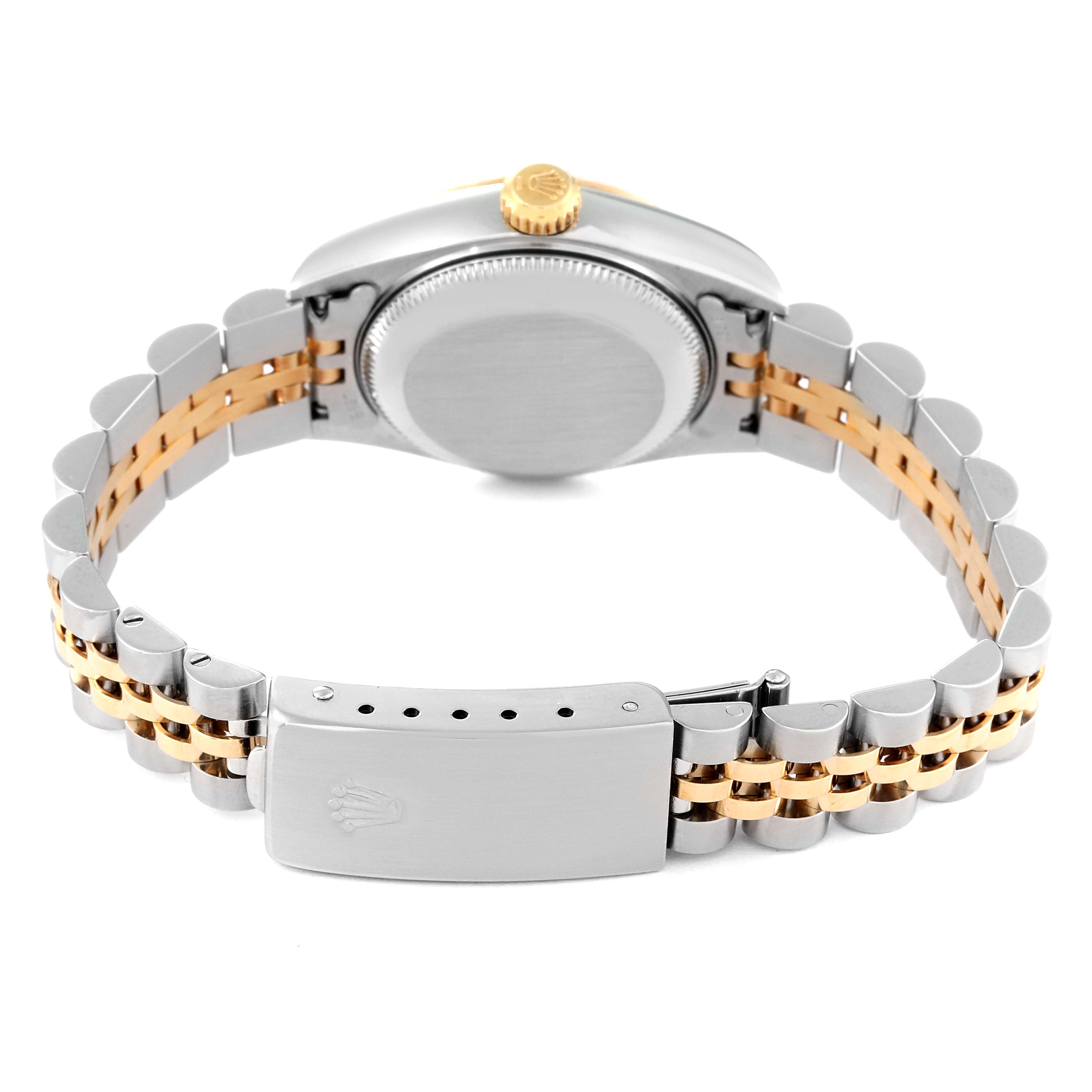 The image shows the back view of a Rolex Datejust 79173 Women's Steel and Gold (two tone) Champagne Dial 79173 Women's Steel and Gold (two tone) Champagne Dial watch, focusing on the case back, crown, and two-tone bracelet with the clasp.