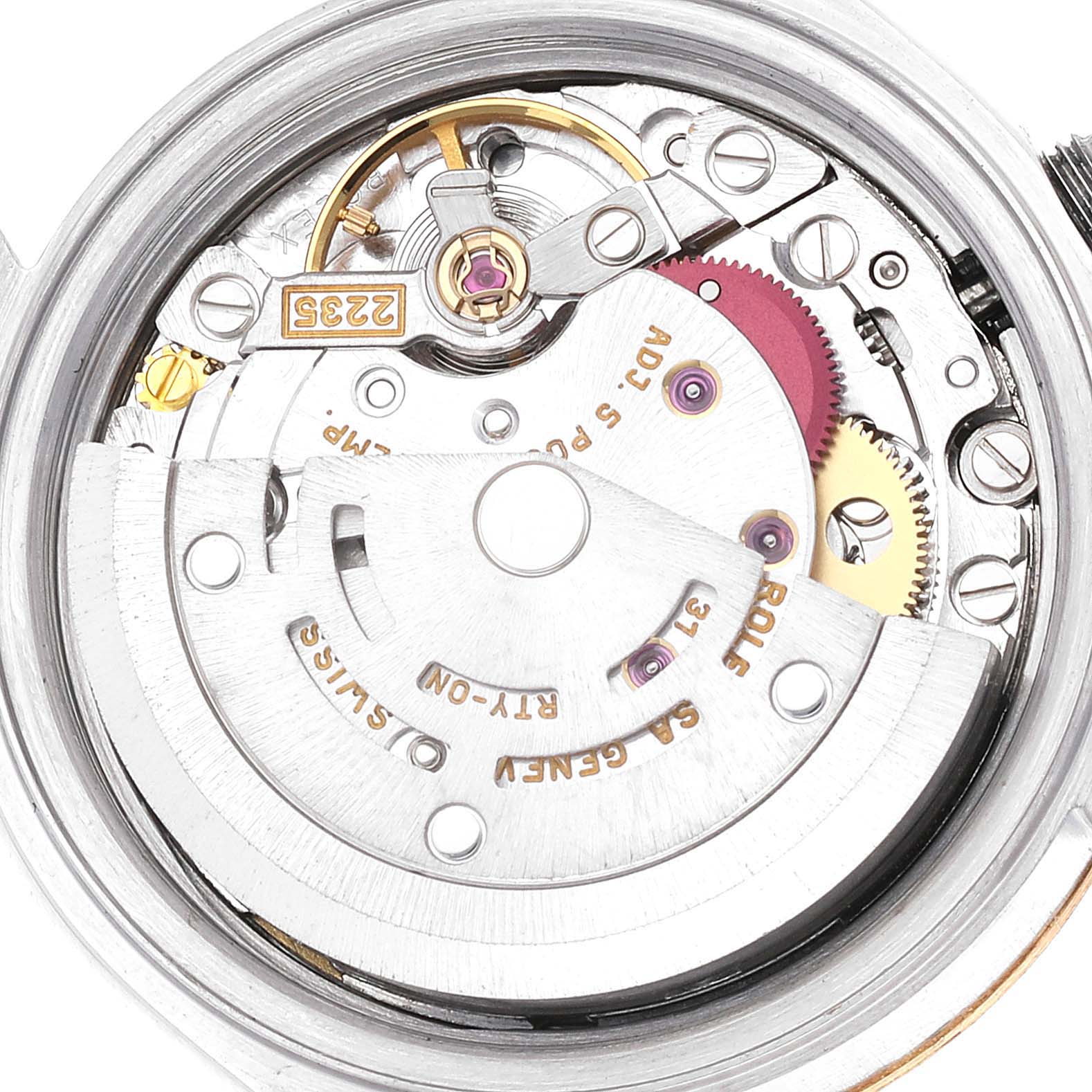 This image shows a close-up view of the internal mechanical movement of a Rolex Datejust 79173 Women's Steel and Gold (two tone) Champagne Dial 79173 Women's Steel and Gold (two tone) Champagne Dial watch.