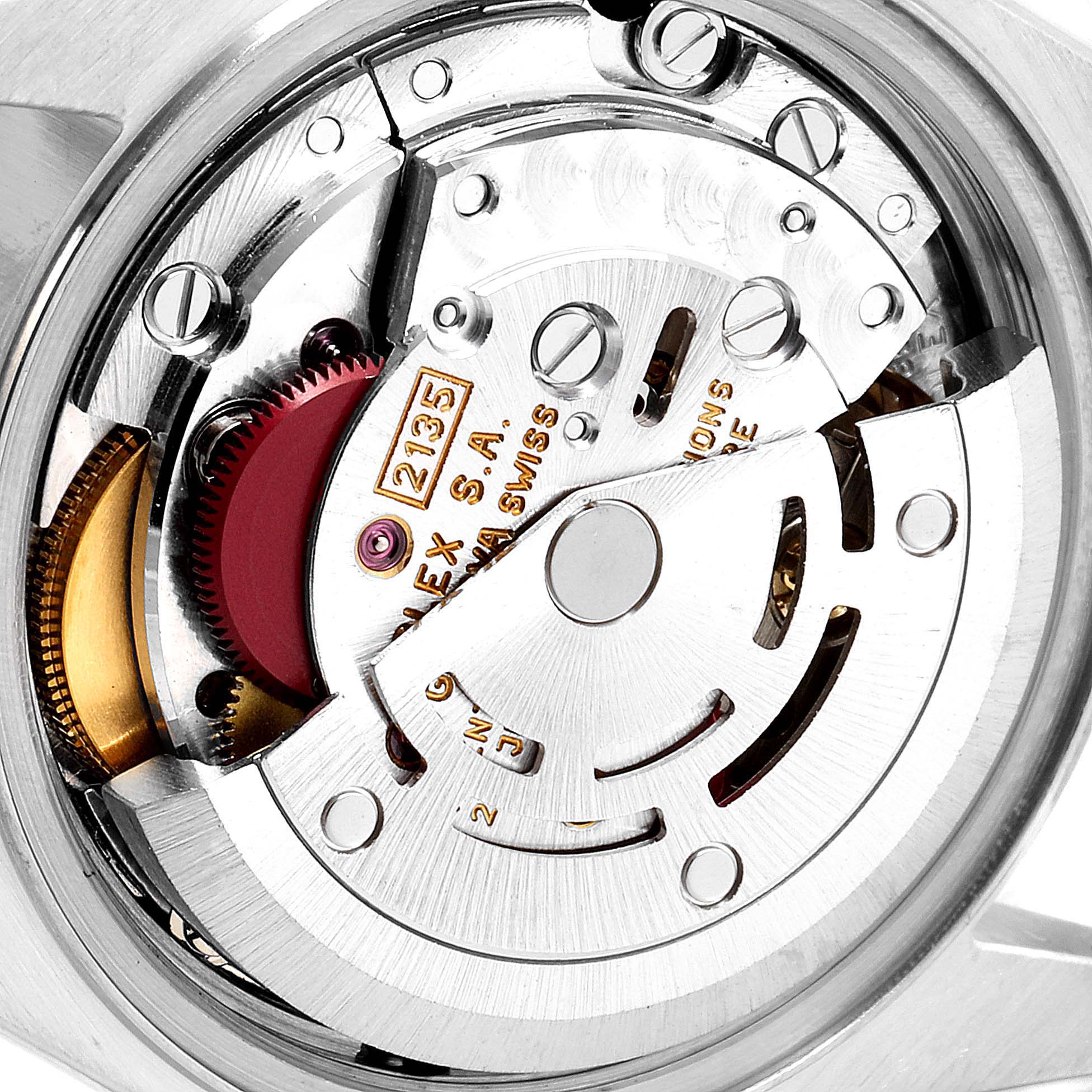 This image shows the internal mechanism of a Rolex Datejust 69173 Women's Steel and Gold (two tone) White Dial 69173 Women's Steel and Gold (two tone) White Dial watch, highlighting components like gears and the rotor.