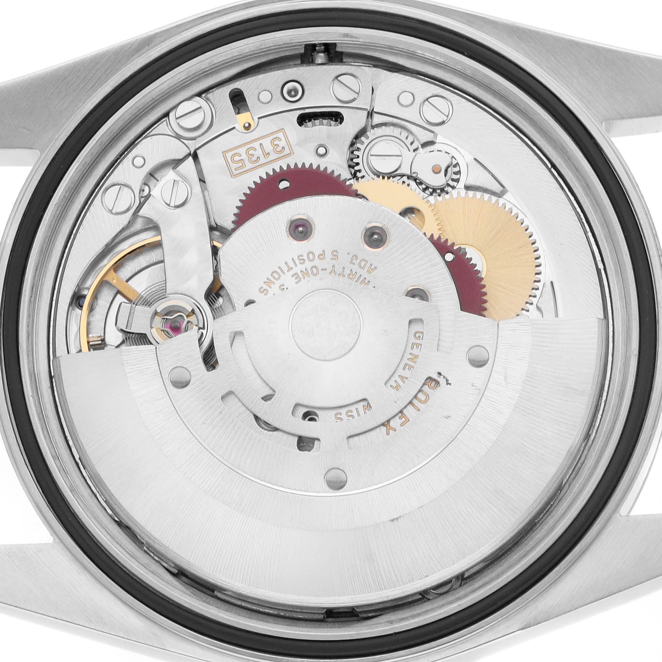 The image shows the backside view of a Rolex Datejust 16220 Men's Stainless Steel White Dial, highlighting its intricate movement mechanisms.