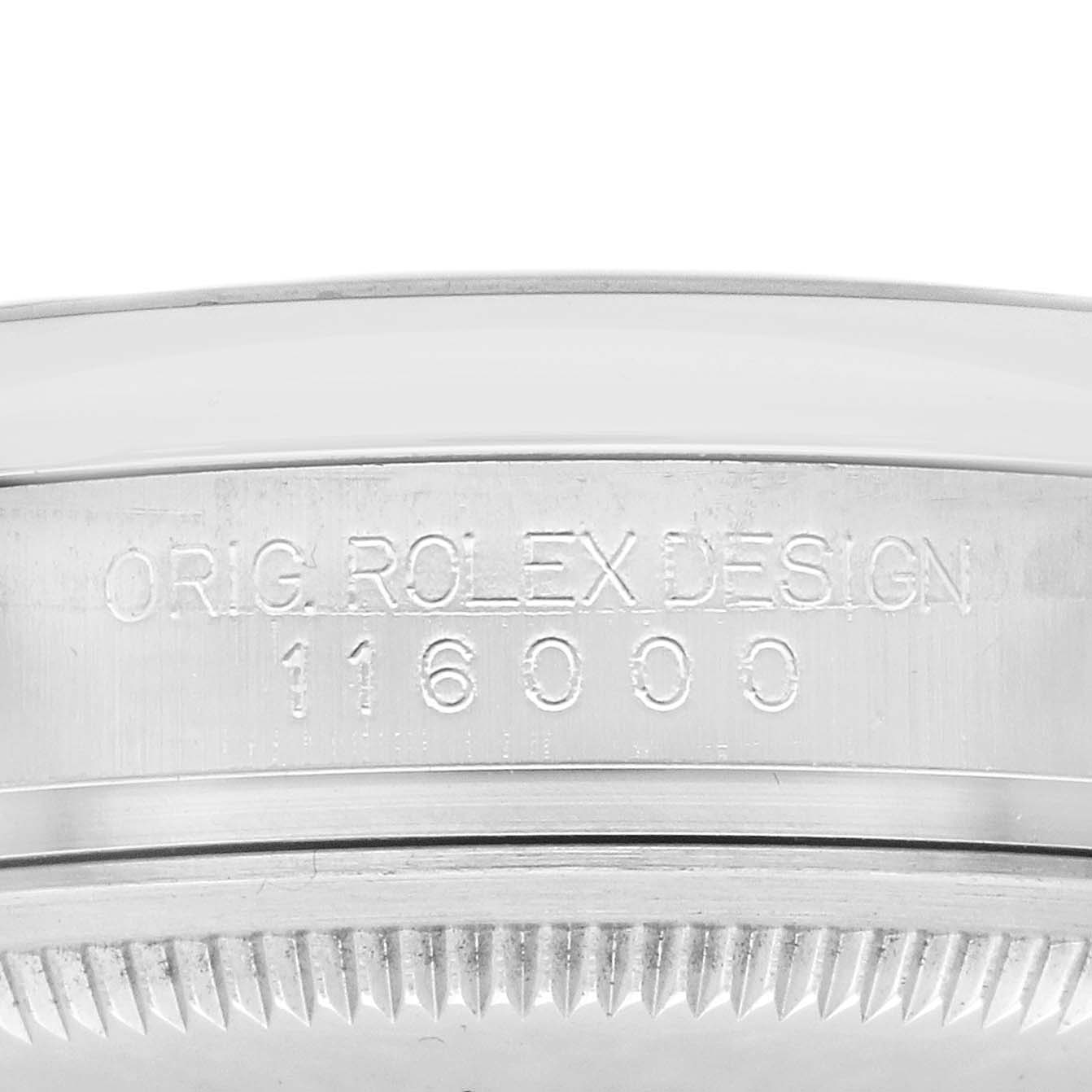 The image shows the side of a Rolex Oyster Perpetual 116000 Men's Stainless Steel Silver Dial watch, featuring the model number "116000" engraved on the case.