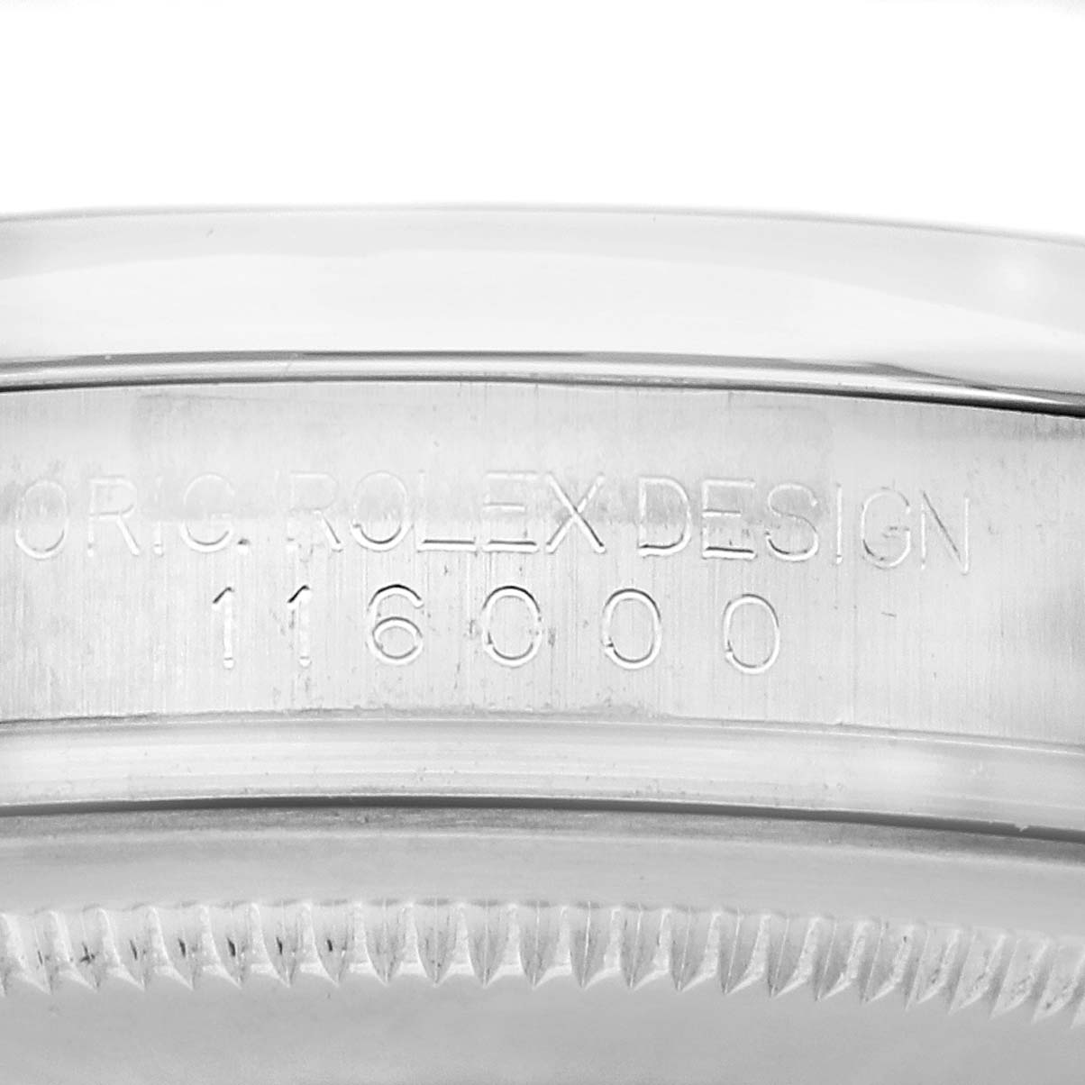 The image shows a close-up of the case side of the Rolex Oyster Perpetual 116000 Men's Stainless Steel Black Dial, featuring the engraved model number.