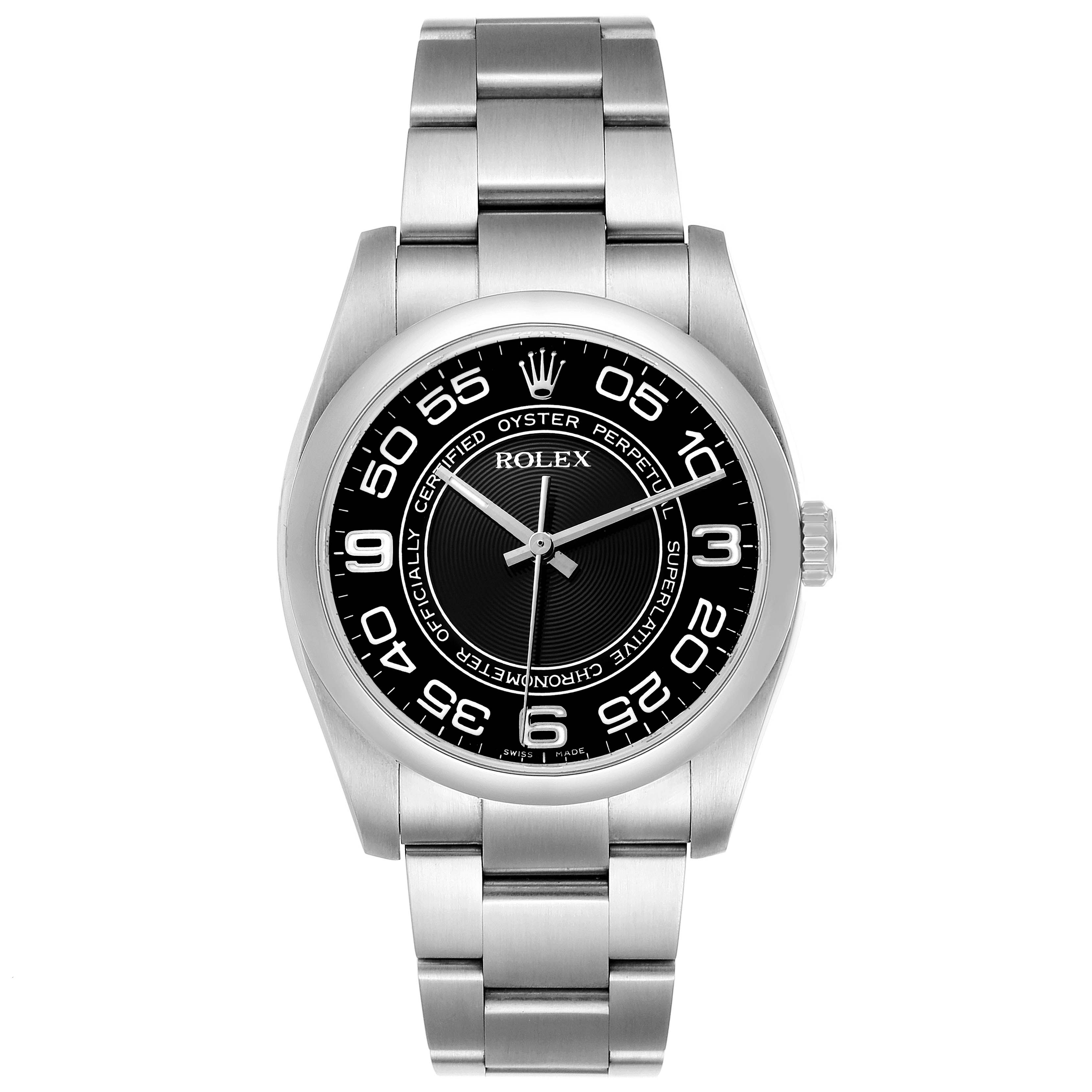 The Rolex Oyster Perpetual 116000 Men's Stainless Steel Black Dial watch is shown from a front angle, displaying the dial, case, and bracelet clearly.