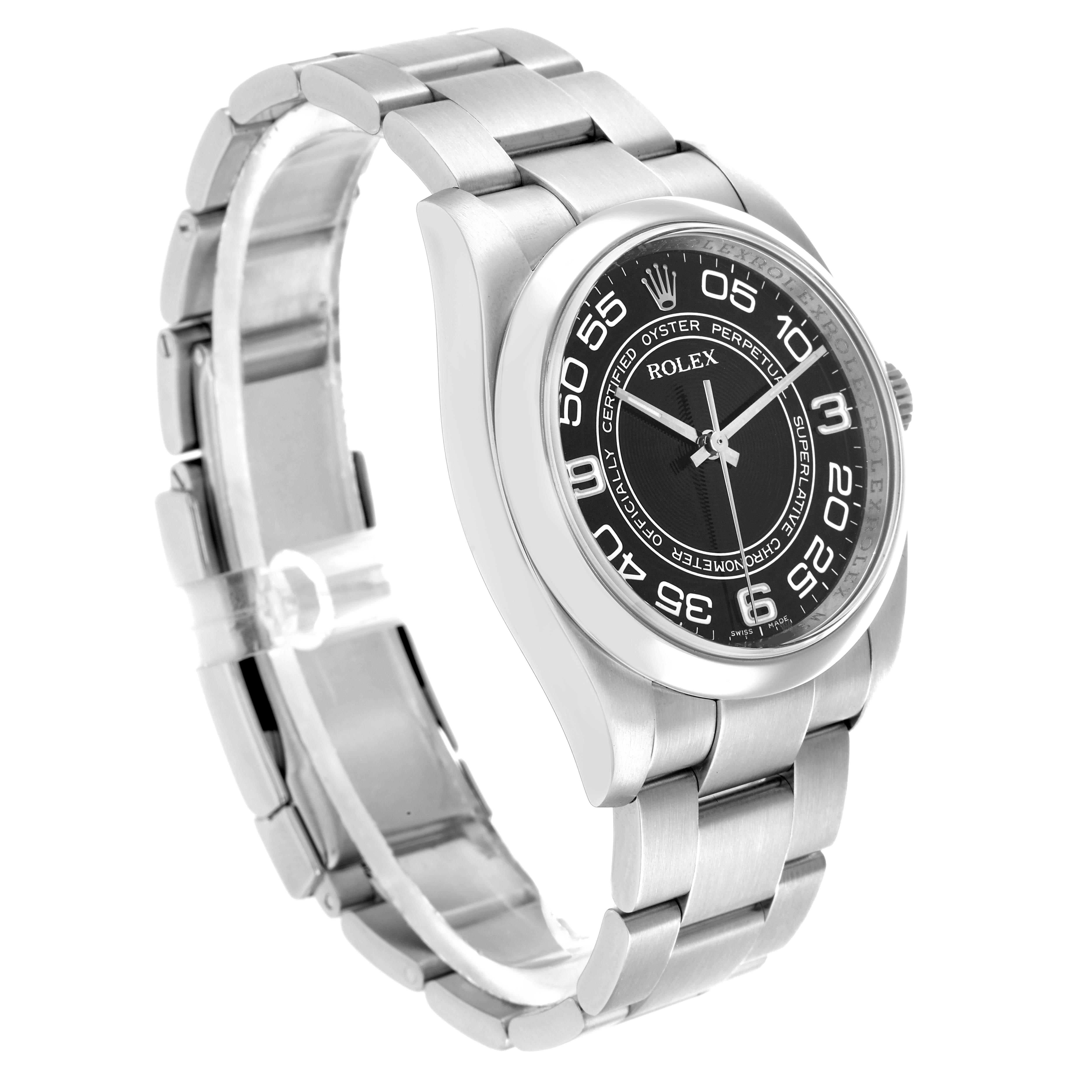 The Rolex Oyster Perpetual 116000 Men's Stainless Steel Black Dial watch is shown at an angled view, highlighting the face, bezel, and linked bracelet.