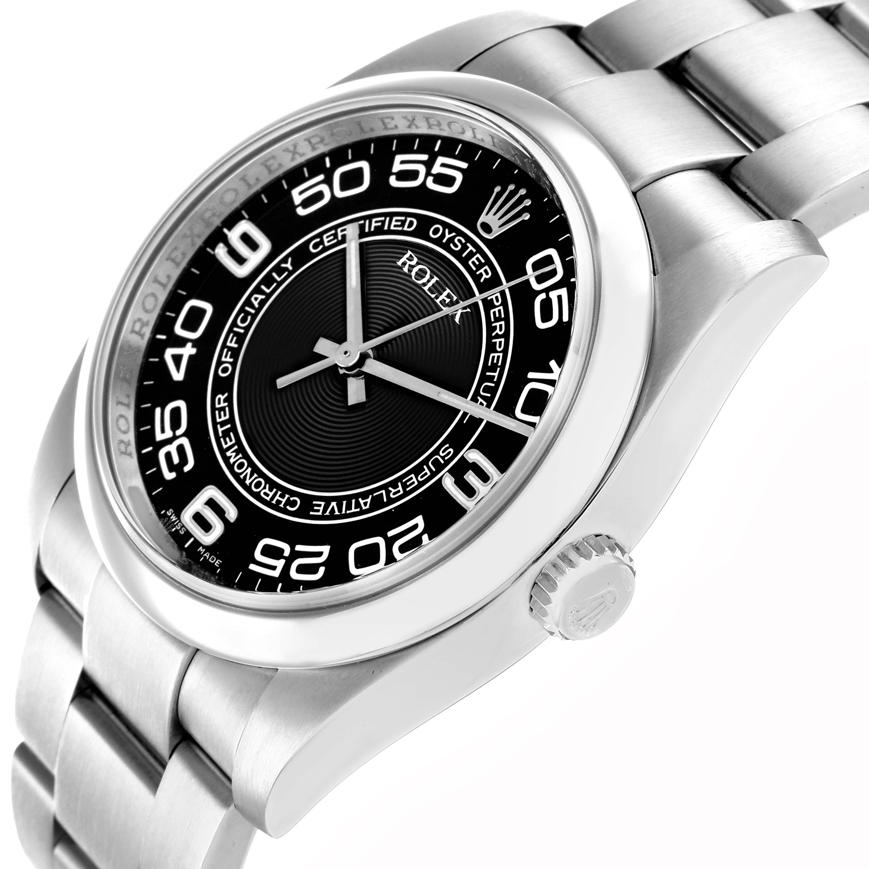 The image shows a Rolex Oyster Perpetual 116000 Men's Stainless Steel Black Dial watch at a slight angle, highlighting the dial, bezel, crown, and part of the bracelet.