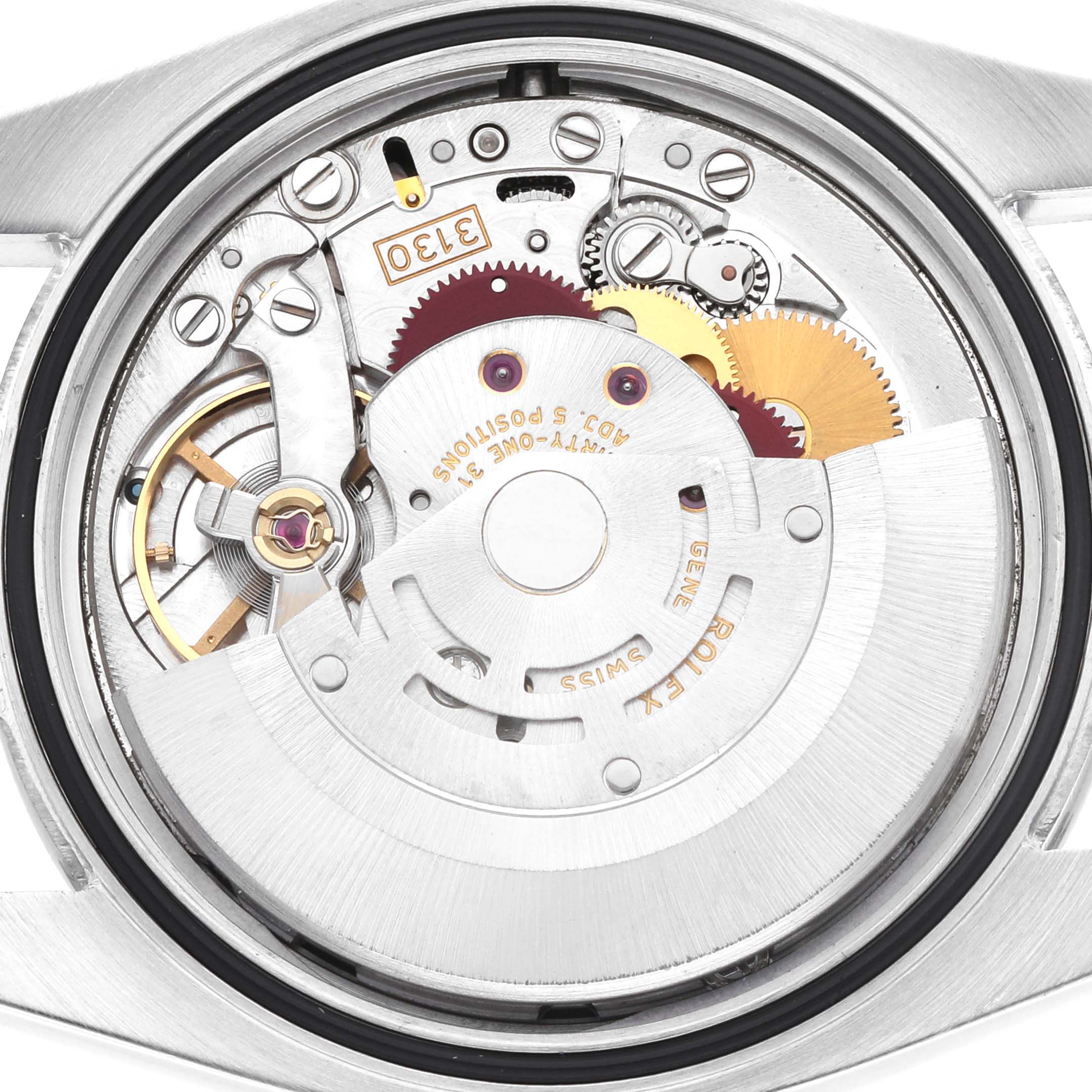The image shows the internal mechanism of a Rolex Oyster Perpetual 116000 Men's Stainless Steel Black Dial watch, highlighting the movement components.