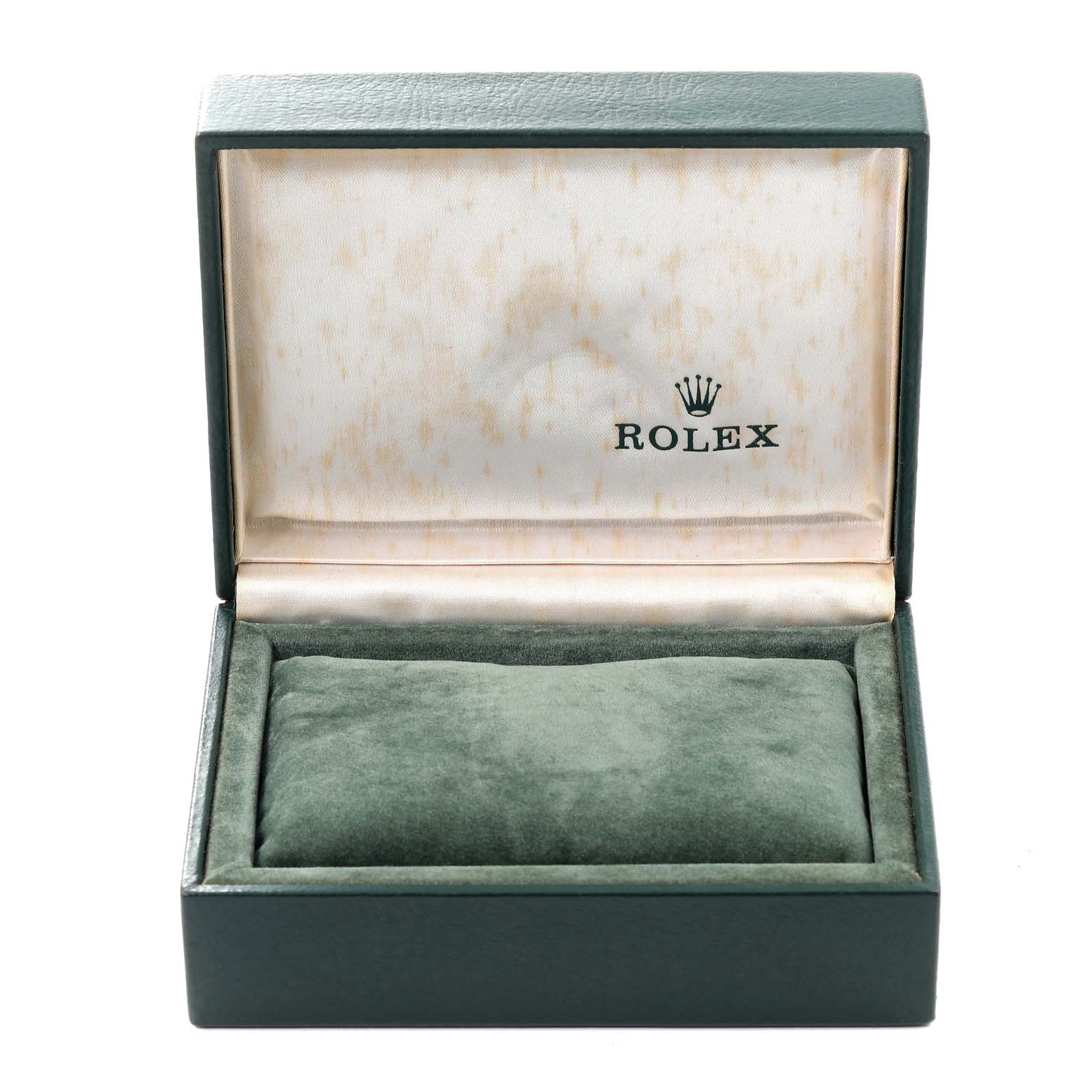 This image shows an open green Rolex box for the Oyster Perpetual model, featuring a velvet cushion and the Rolex logo.