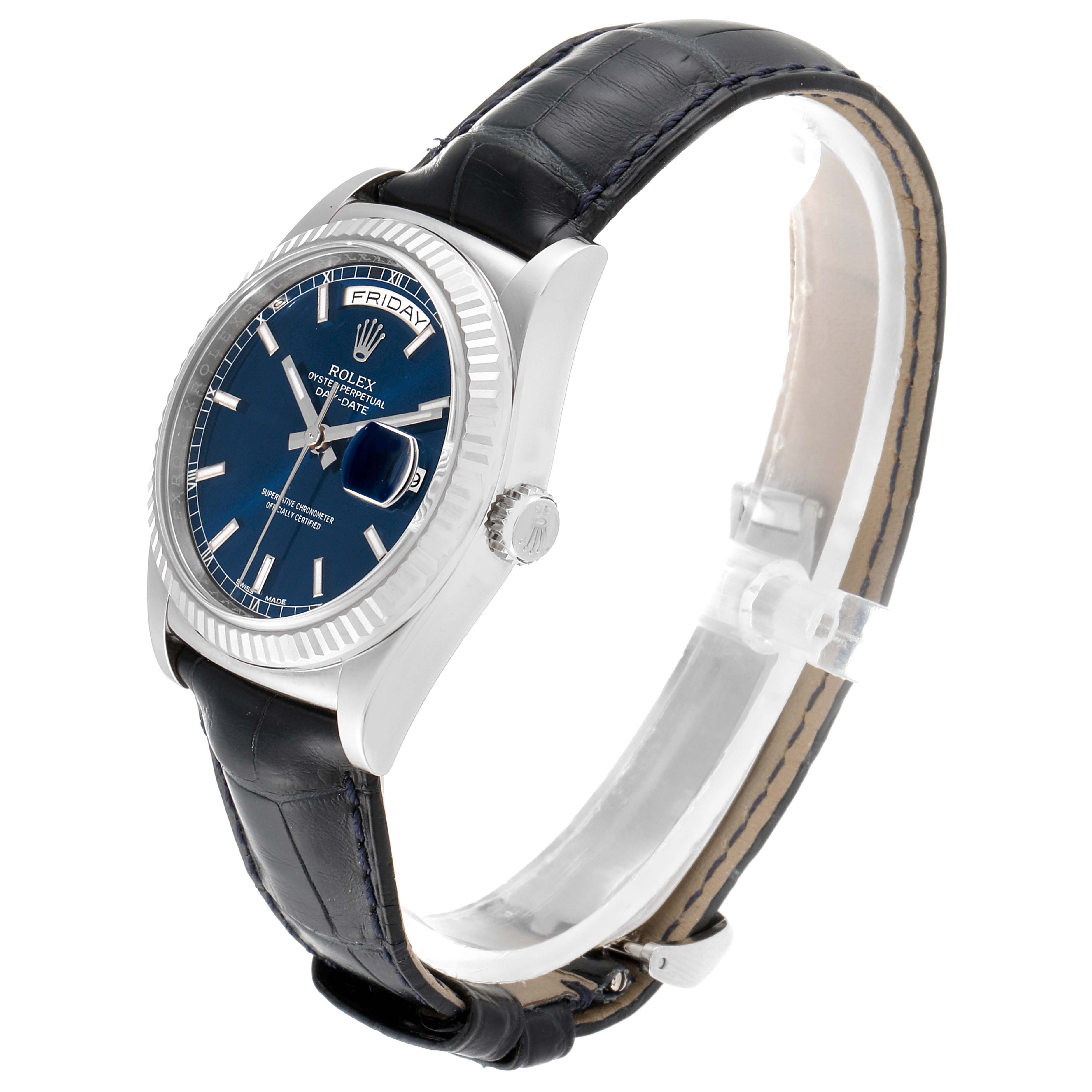 The image shows a side angle of the Rolex President 118139 Men's White Gold Blue Dial 118139 Men's White Gold Blue Dial model watch, highlighting its blue dial, fluted bezel, and leather strap.