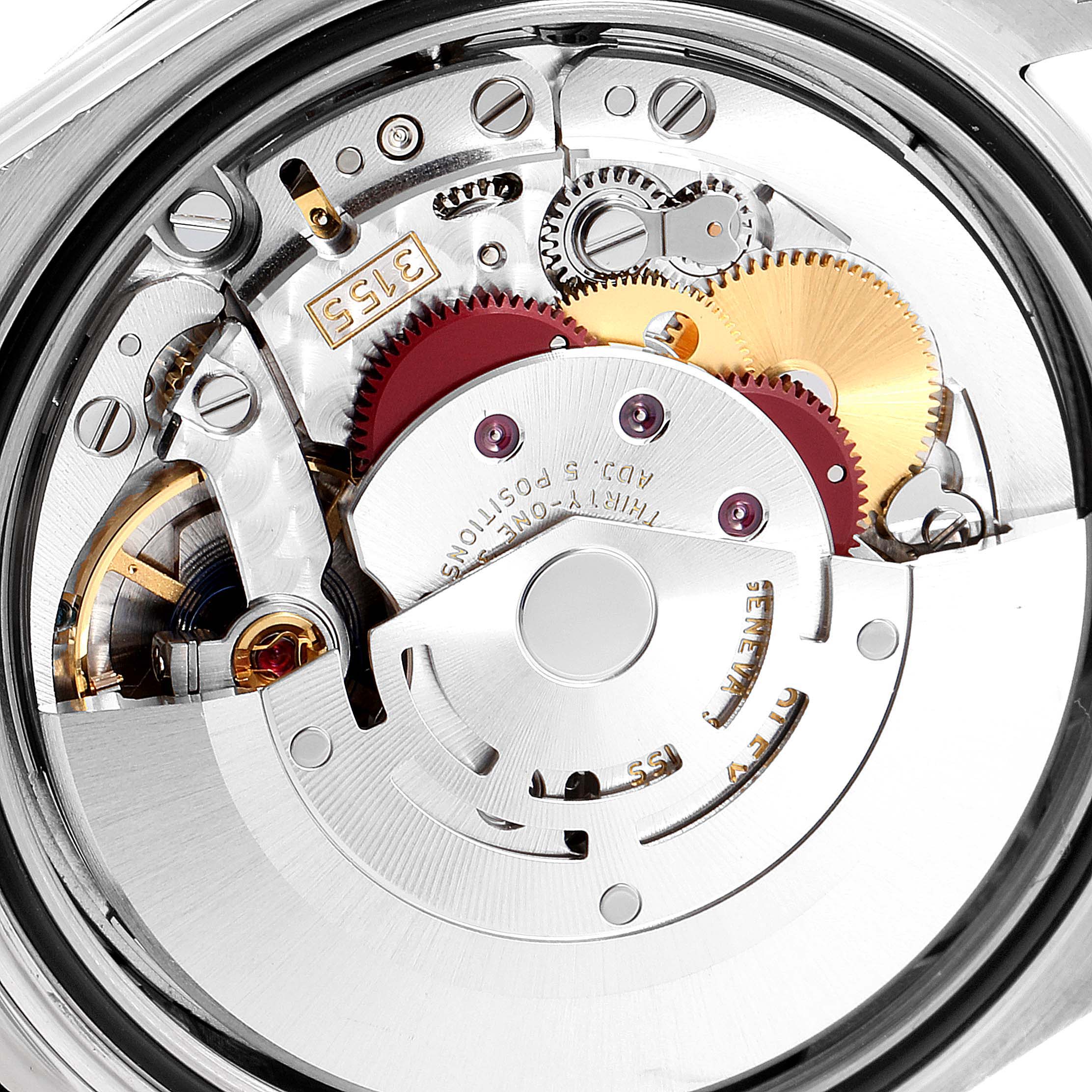 This image shows a close-up view of the Rolex President 118139 Men's White Gold Blue Dial 118139 Men's White Gold Blue Dial model's movement mechanism.