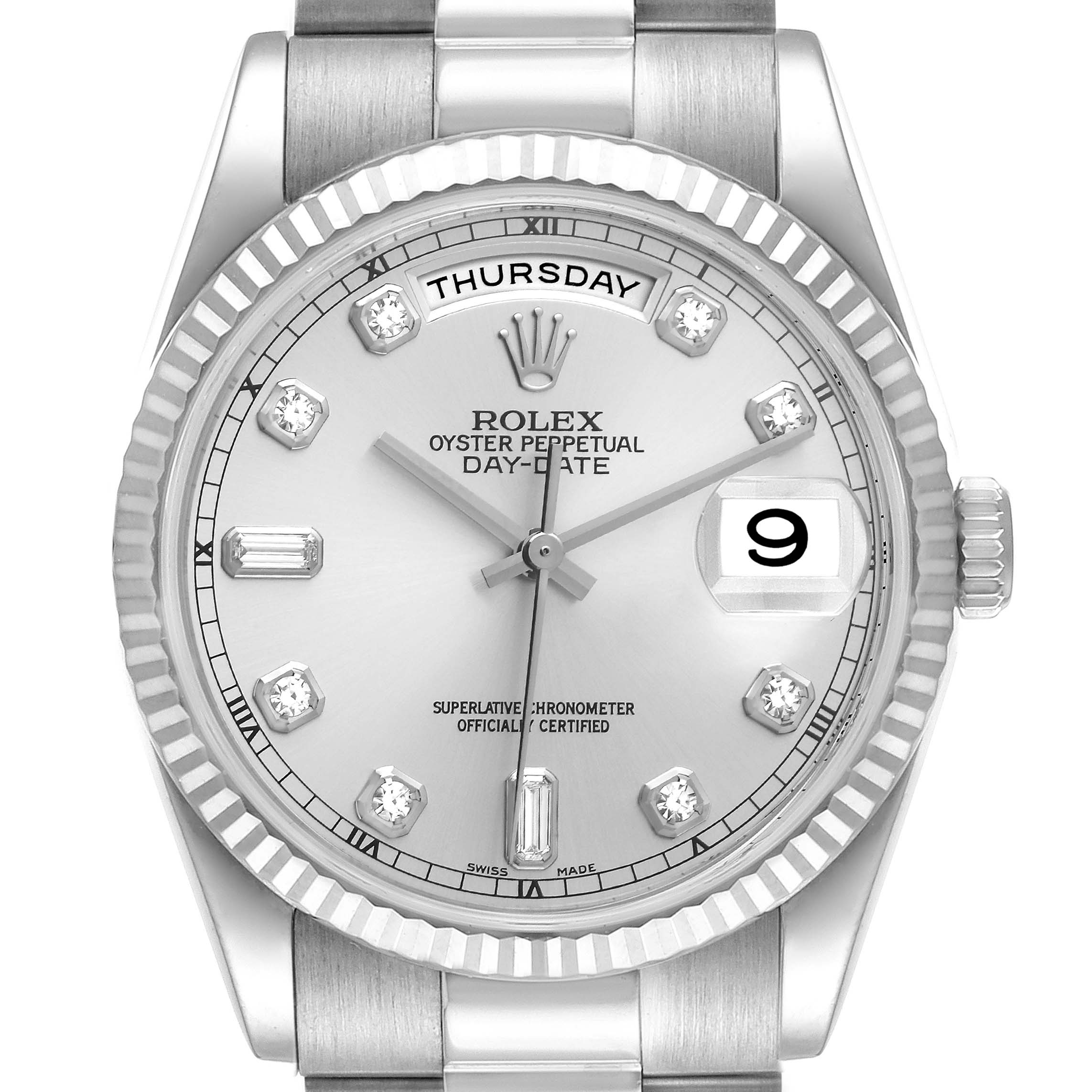 Shown is the face of the Rolex President 118239 Men's White Gold Silver Dial 118239 Men's White Gold Silver Dial model, displaying the day, date, hands, and markers, with part of the bracelet visible.