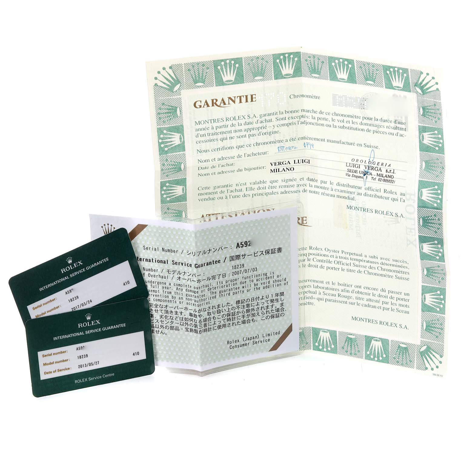 The image shows warranty papers and international service guarantee cards for the Rolex President 18239 Men's White Gold Silver Dial 18239 Men's White Gold Silver Dial model watch.