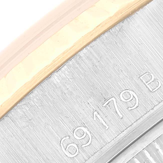 This is a close-up image of the case edge and part of the bezel showing the model number of the Rolex President 69179 Women's White Gold Champagne Dial 69179 Women's White Gold Champagne Dial watch.