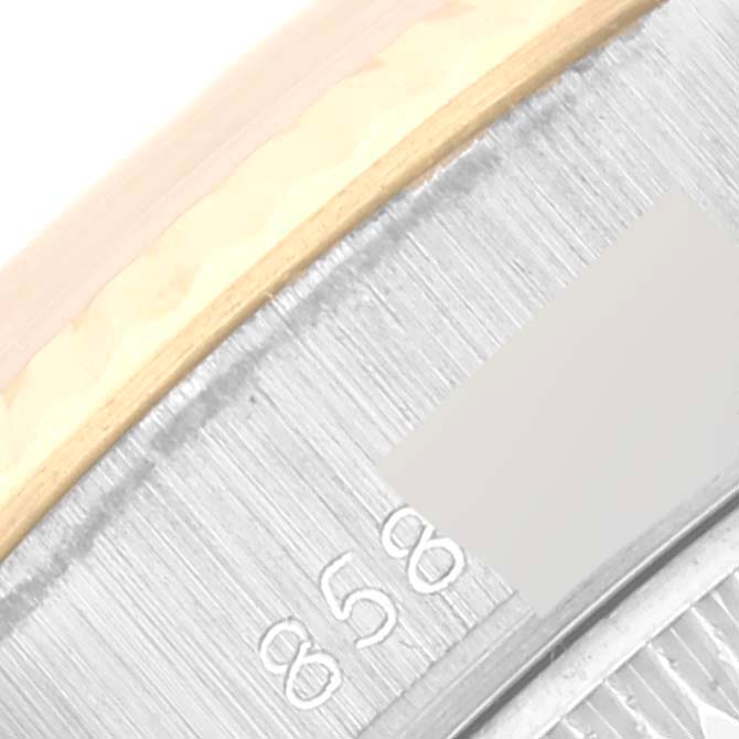 This image shows a macro view of the outer edge of the bezel and the serial numbers engraved on a Rolex President 69179 Women's White Gold Champagne Dial 69179 Women's White Gold Champagne Dial model watch.