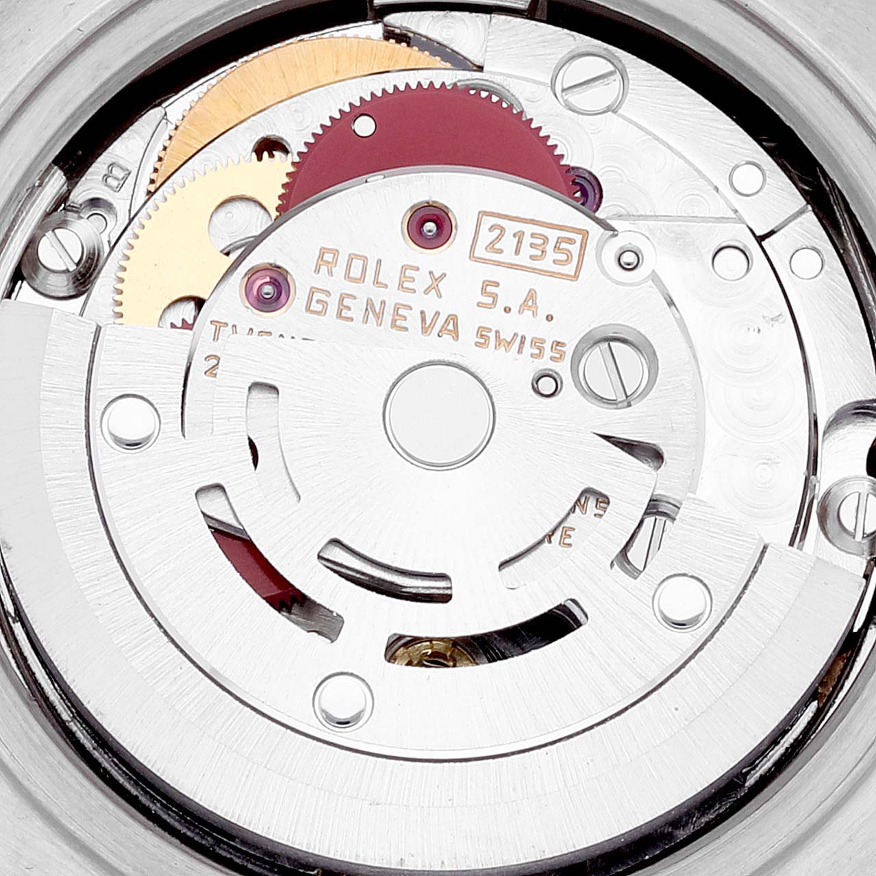The image shows the intricate inner mechanism of a Rolex President 69179 Women's White Gold Champagne Dial 69179 Women's White Gold Champagne Dial model, including gears and the brand inscription.
