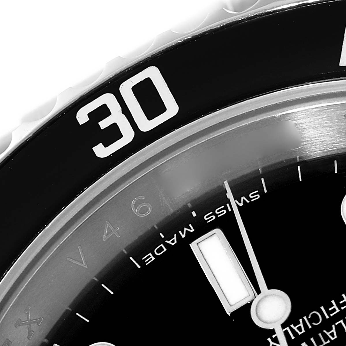 The image shows a close-up of the bezel and dial of a Rolex Submariner 16610 Men's Stainless Steel Black Dial 16610 Men's Stainless Steel Black Dial watch, emphasizing the “30” minute mark and part of the hour markers.