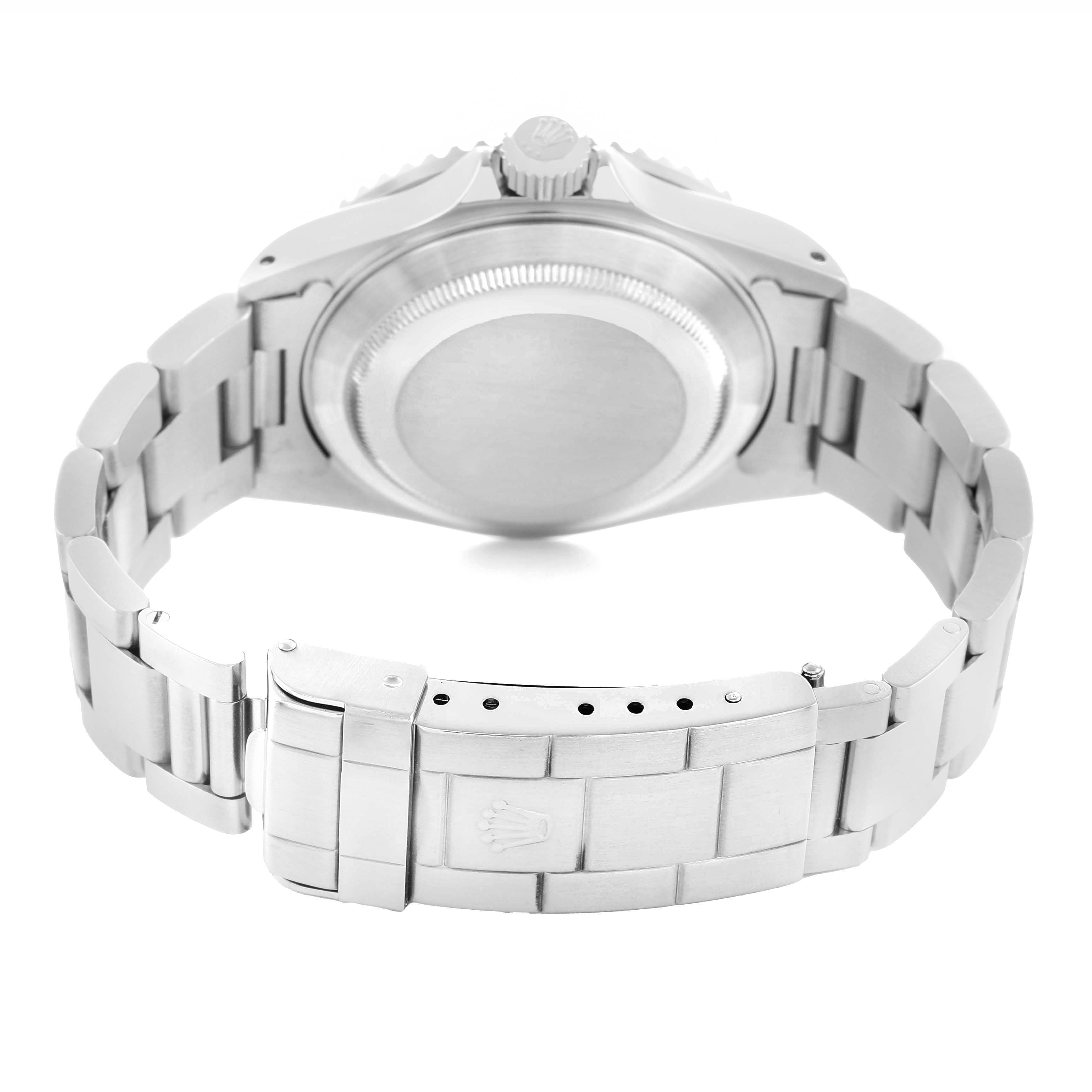 The image shows the back of a Rolex Submariner 16610 Men's Stainless Steel Black Dial, highlighting the case back, clasp, and bracelet links.