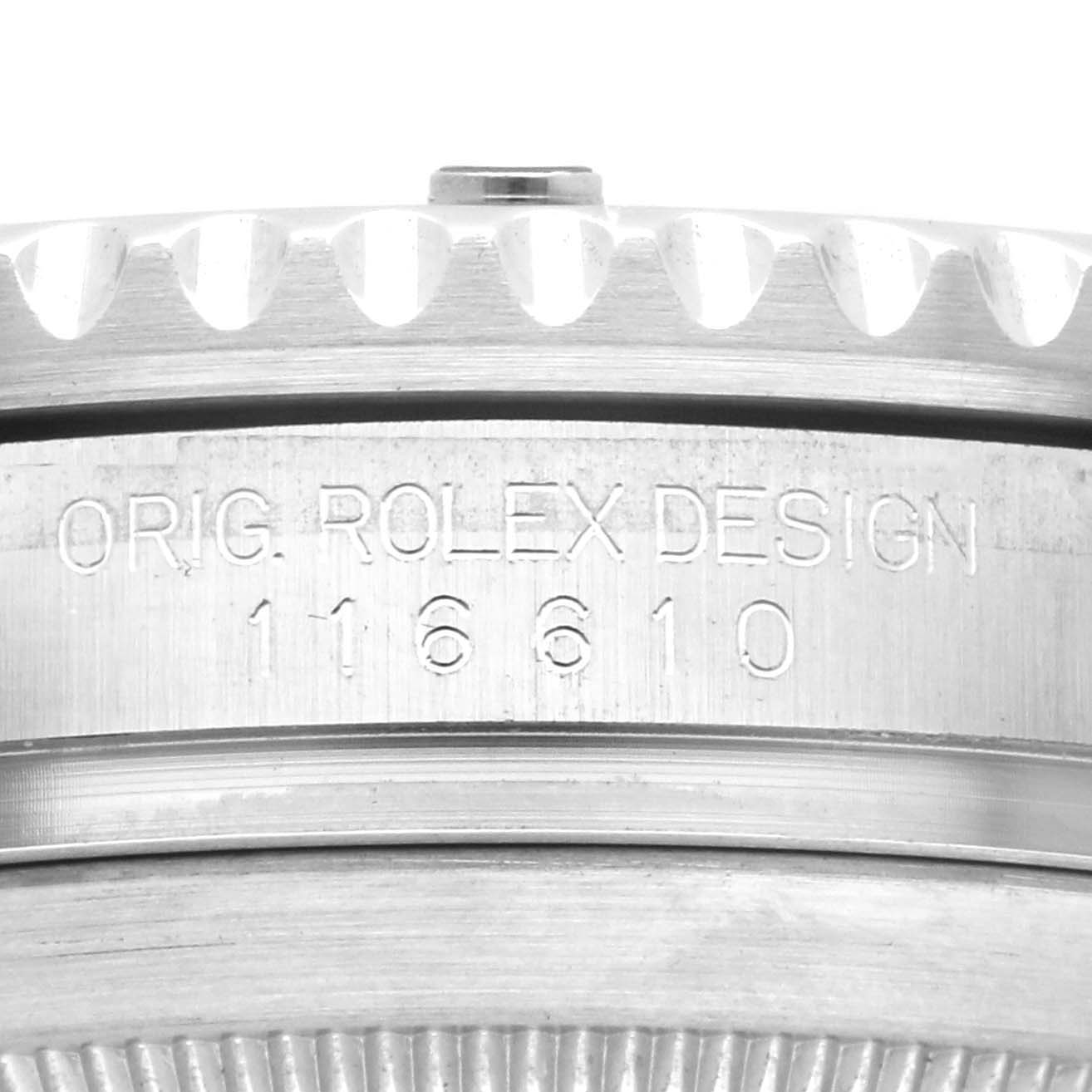 The image shows a close-up side view of a Rolex Submariner 116610LV Men's Stainless Steel Green Dial, focusing on the engraved design number.