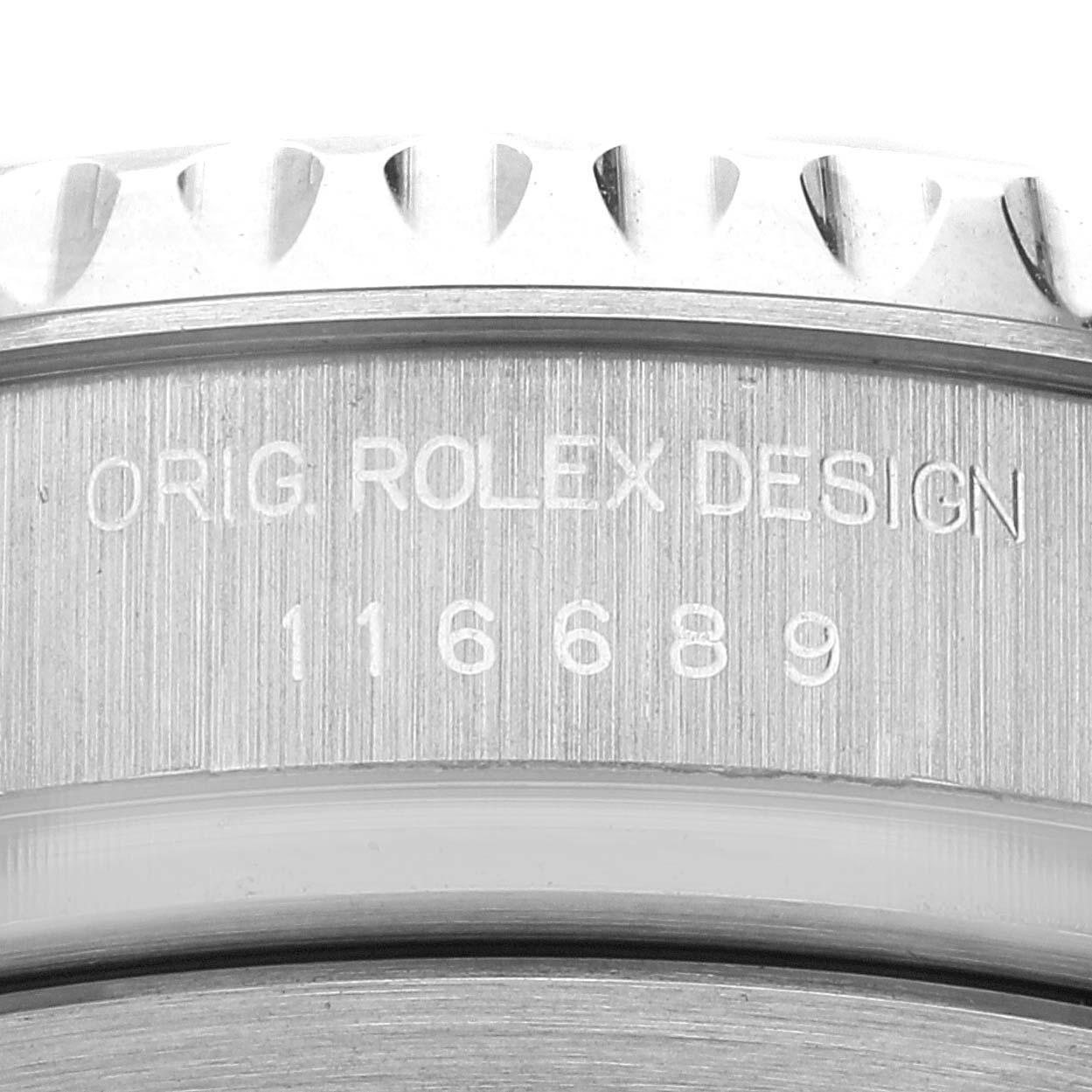 The image shows the side engraving of the case with the model number of a Rolex Yacht-Master 116689 Men's White Gold White Dial 116689 Men's White Gold White Dial watch.