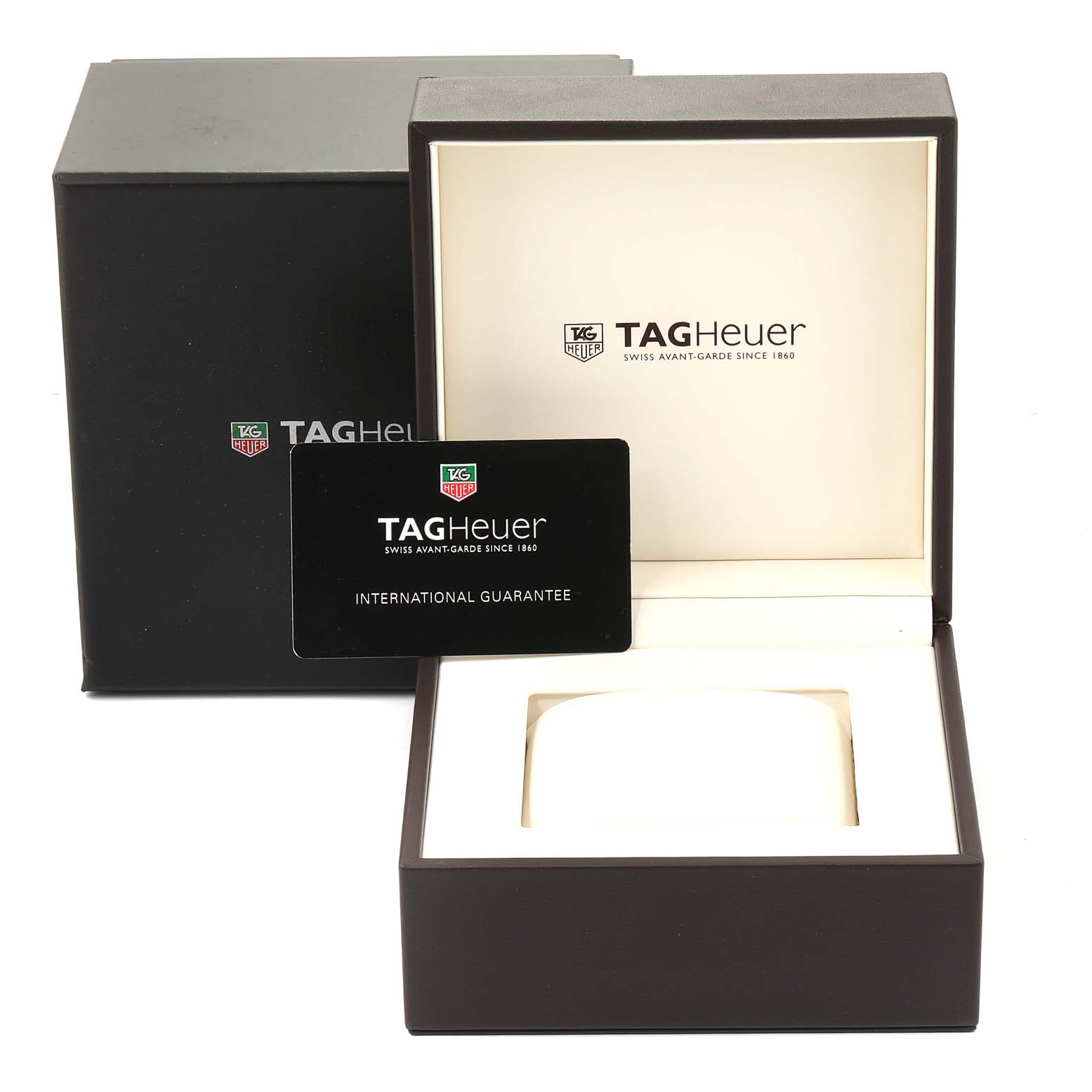 The image shows the packaging box, an international guarantee card, and the protective cushion for the Tag Heuer Carrera WV2412.BA0793 Women
s Stainless Steel Black Dial WV2412.BA0793 Women
s Stainless Steel Black Dial model watch.