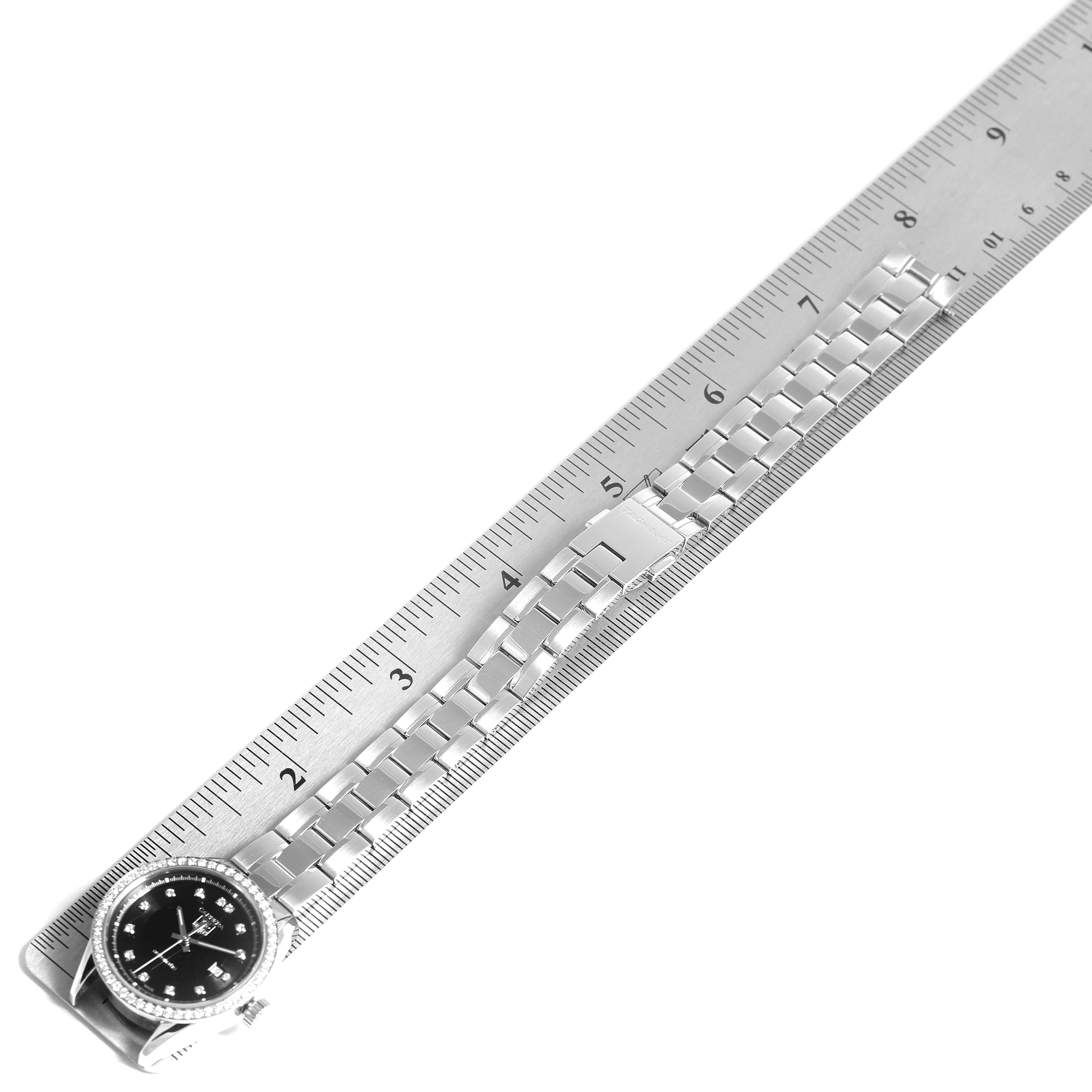 The Tag Heuer Carrera WV2412.BA0793 Women
s Stainless Steel Black Dial WV2412.BA0793 Women
s Stainless Steel Black Dial watch is shown from an angled top view, displaying the face and metal bracelet.