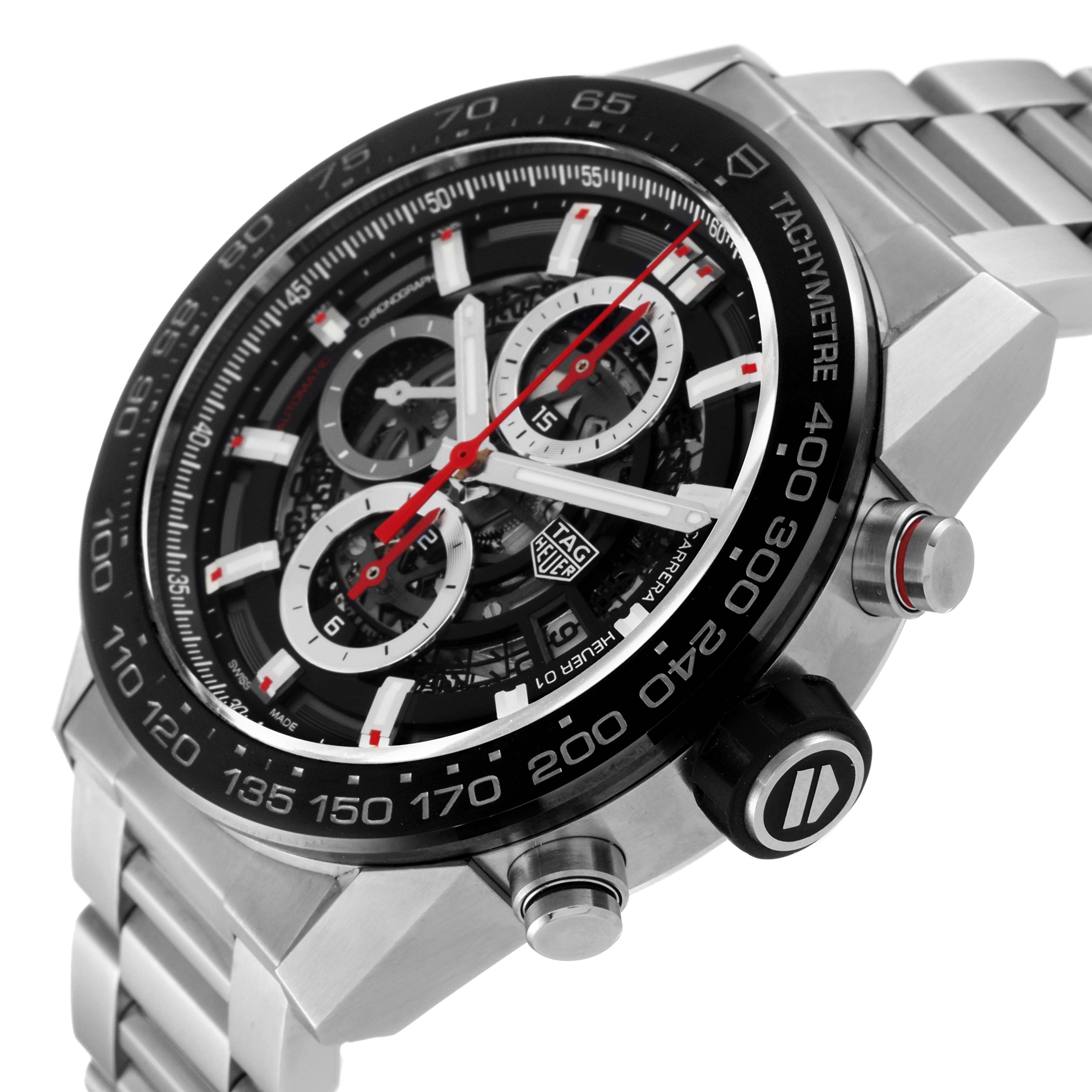The image shows a close-up, angled view of the Tag Heuer Carrera CAR2A1W.BA0703 Men's Stainless Steel Transparent Dial CAR2A1W.BA0703 Men's Stainless Steel Transparent Dial watch, highlighting its dial, bezel, and stainless steel bracelet.