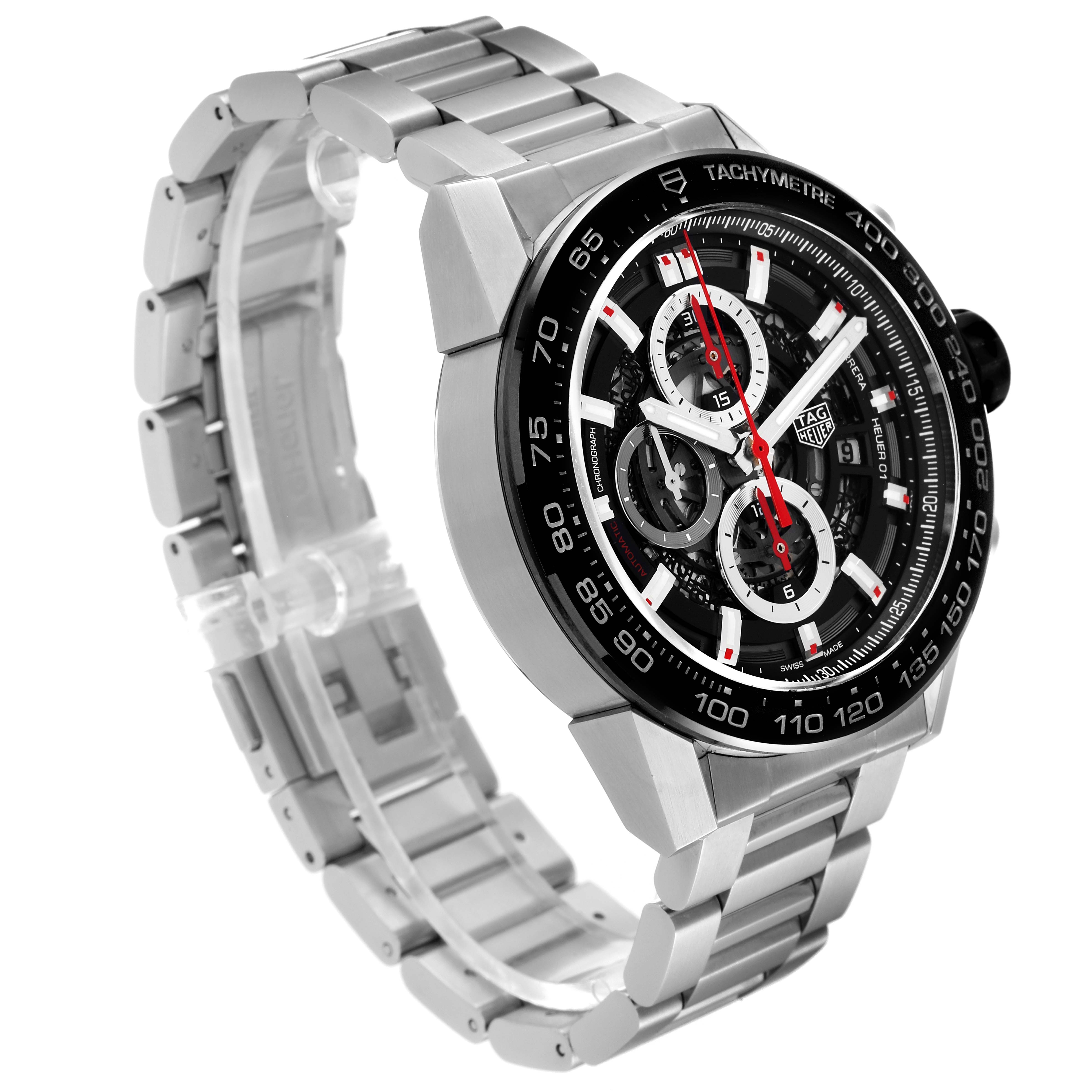 The image displays a side angle of the Tag Heuer Carrera CAR2A1W.BA0703 Men's Stainless Steel Transparent Dial CAR2A1W.BA0703 Men's Stainless Steel Transparent Dial watch, showcasing the face, tachymetre bezel, and metal bracelet.
