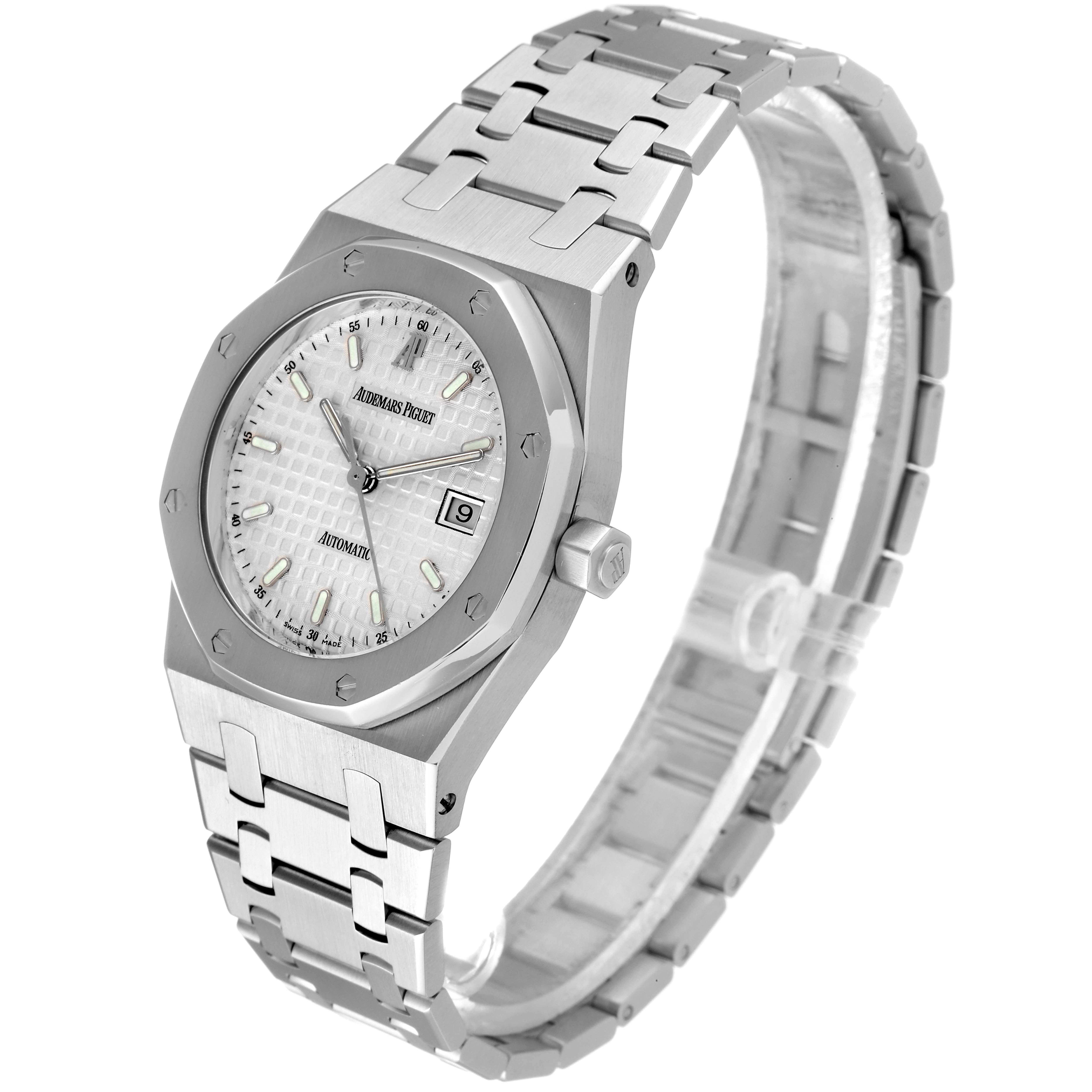 The image shows a side-angle view of an Audemars Piguet Royal Oak 15000ST Men's Stainless Steel Silver Dial 15000ST Men's Stainless Steel Silver Dial watch, highlighting its face, crown, and bracelet.