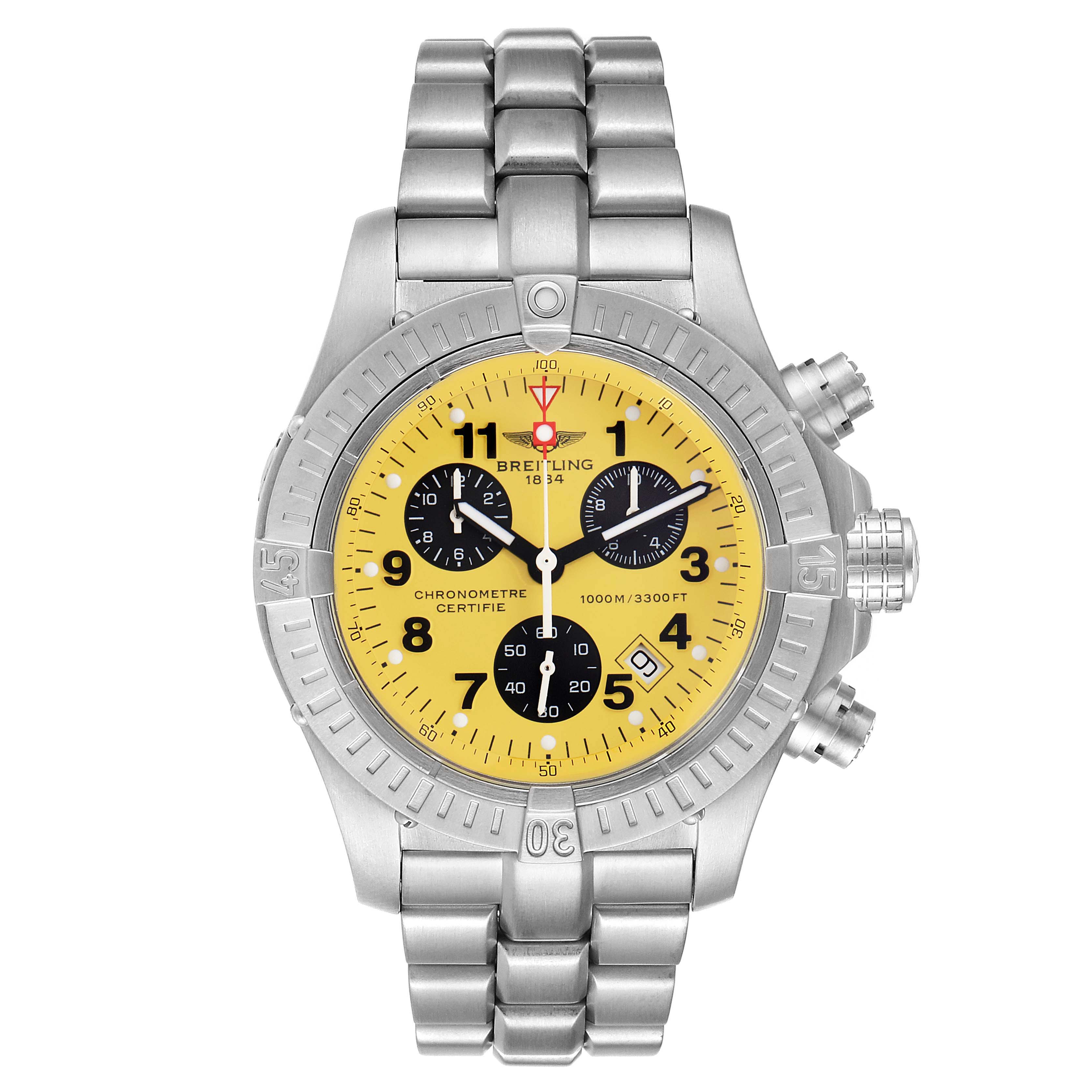 The image shows a front view of a Breitling Avenger E73360 Men's Titanium Yellow Dial E73360 Men's Titanium Yellow Dial watch, displaying its yellow dial, subdials, and stainless steel bracelet.