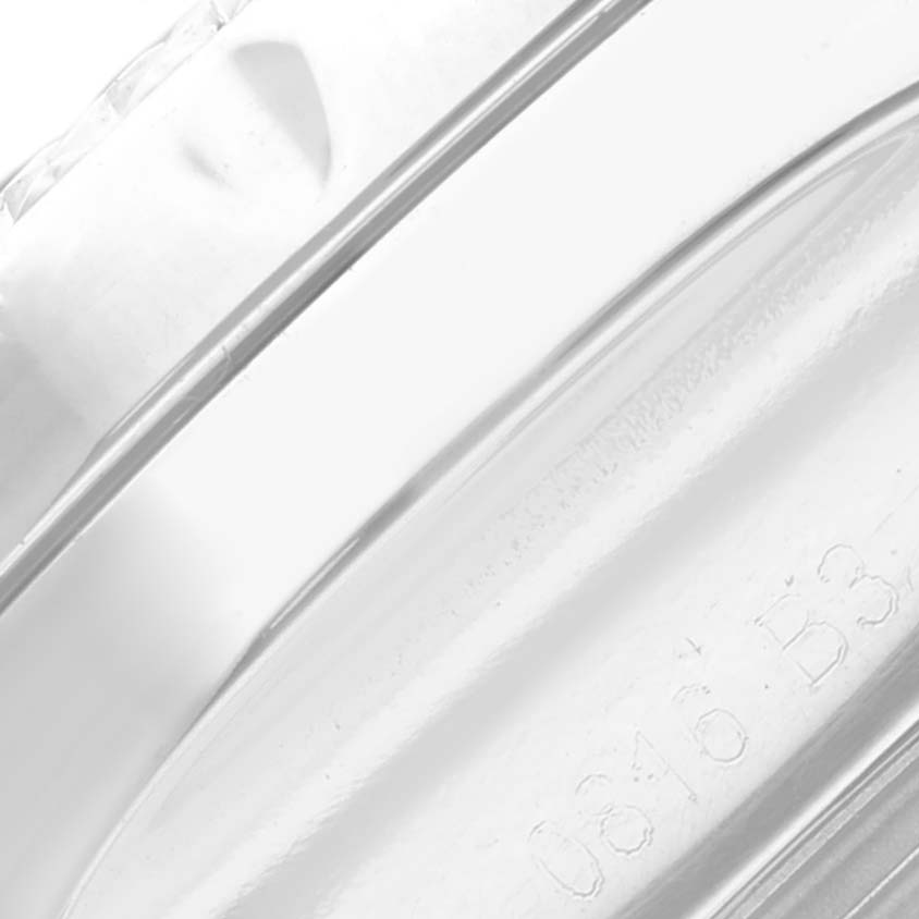 The image shows a close-up of the side of a Bentley model by Breitling watch bezel, focusing on the edge and part of the engraving.