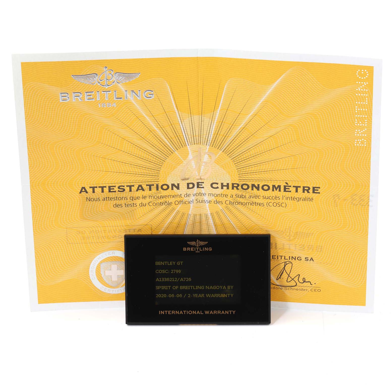 The image shows a Breitling Bentley A13362 Men's Stainless Steel Silver Dial A13362 Men's Stainless Steel Silver Dial model's chronometer certificate and international warranty card.